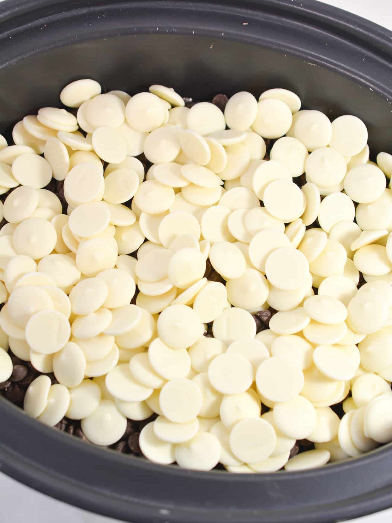 Layer the white chocolate bark or wafers on the top.