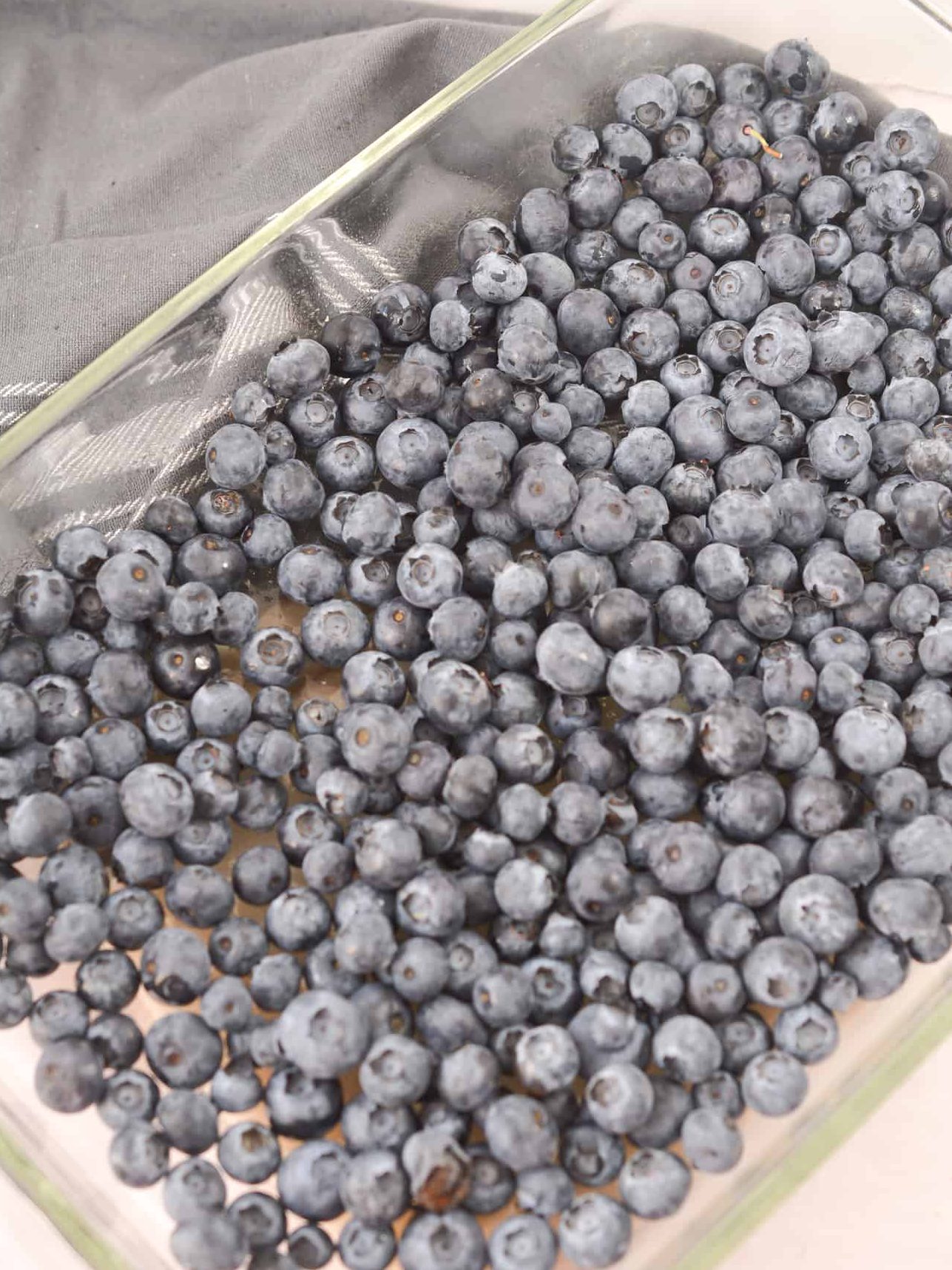 Layer the blueberries in the bottom of a well-greased 9x13 baking dish.