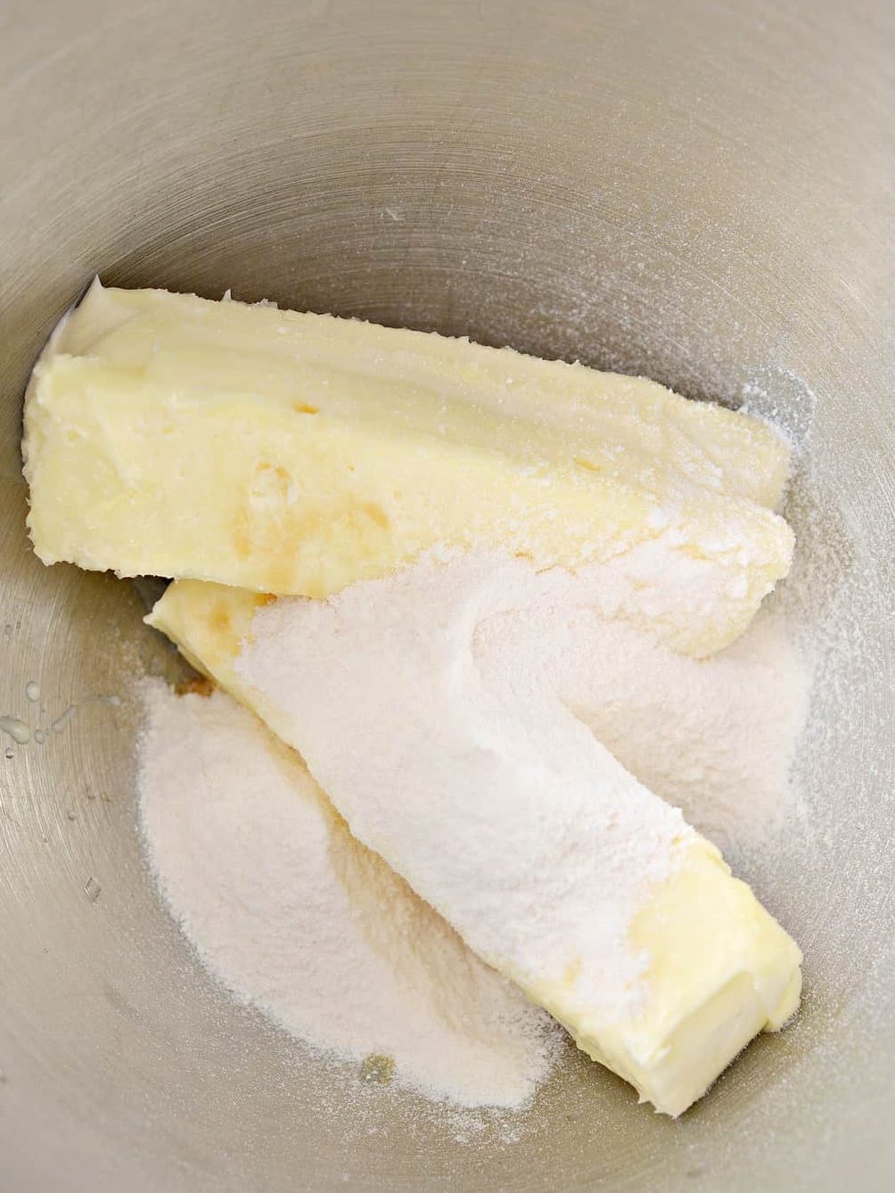 Mix together the 2 sticks of butter and the cheesecake pudding mix together until creamy.