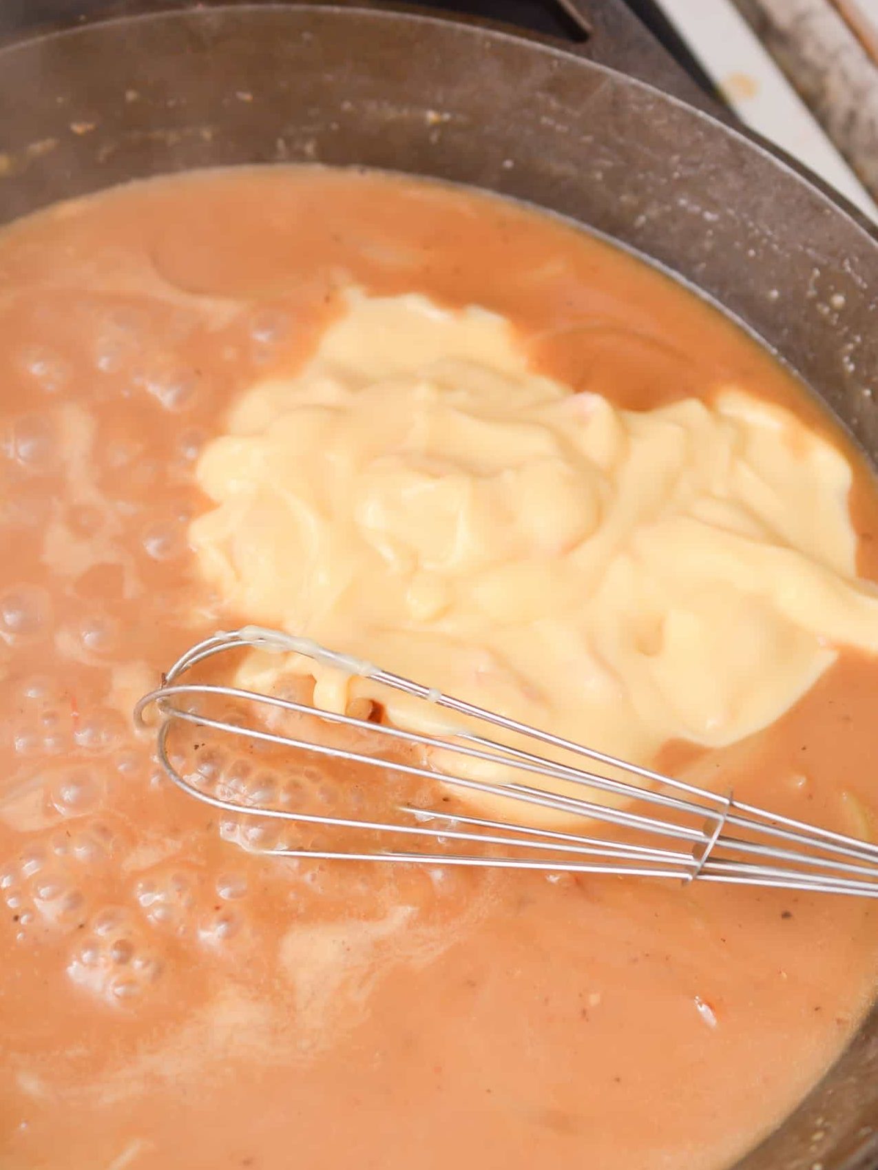 Pour the soup into the skillet, and whisk to combine.