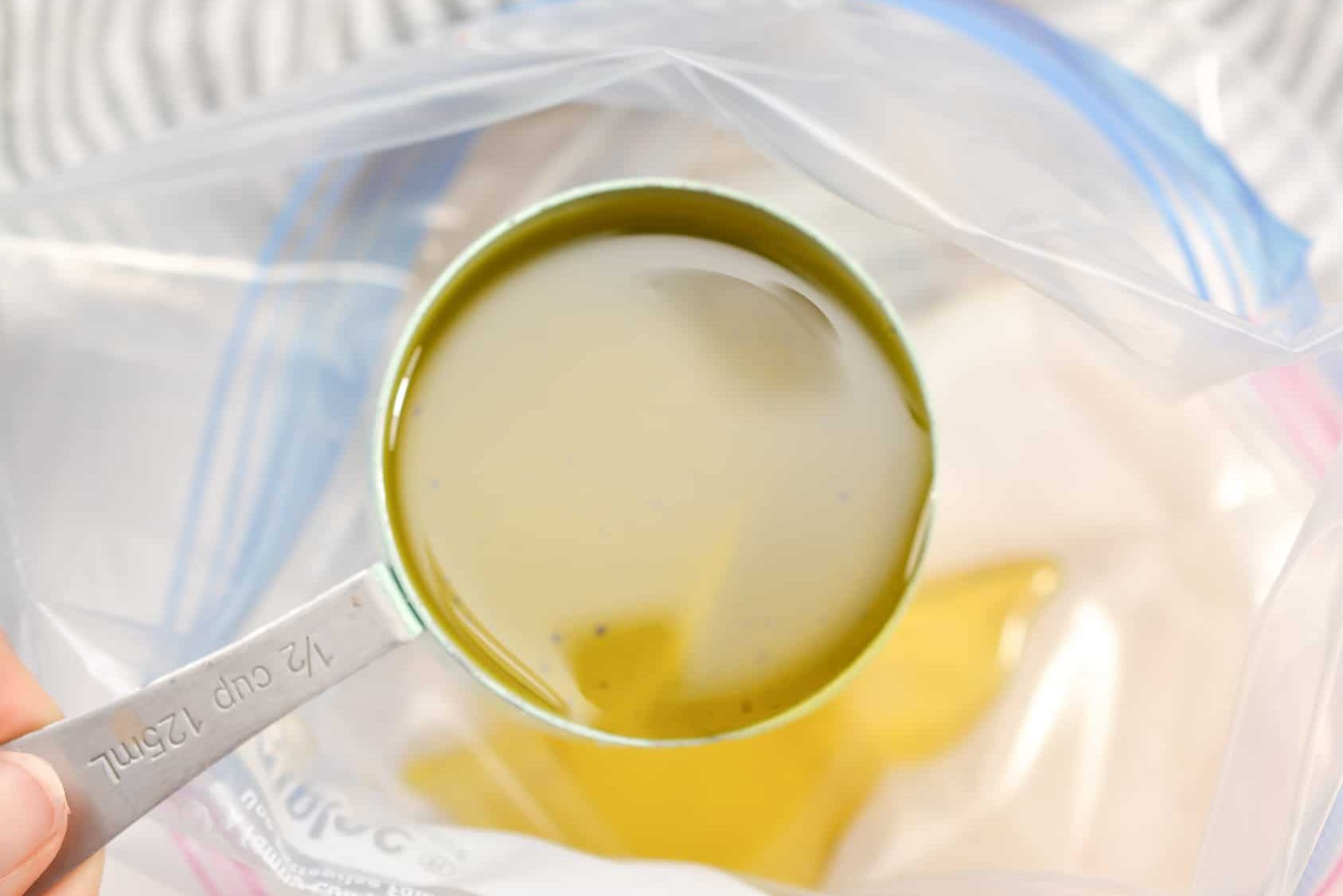 In a Ziploc bag lace ½ cup of olive oil.