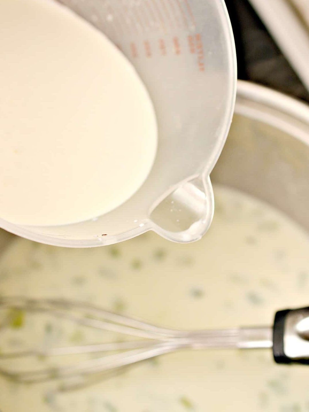 Whisk in the heavy whipping cream