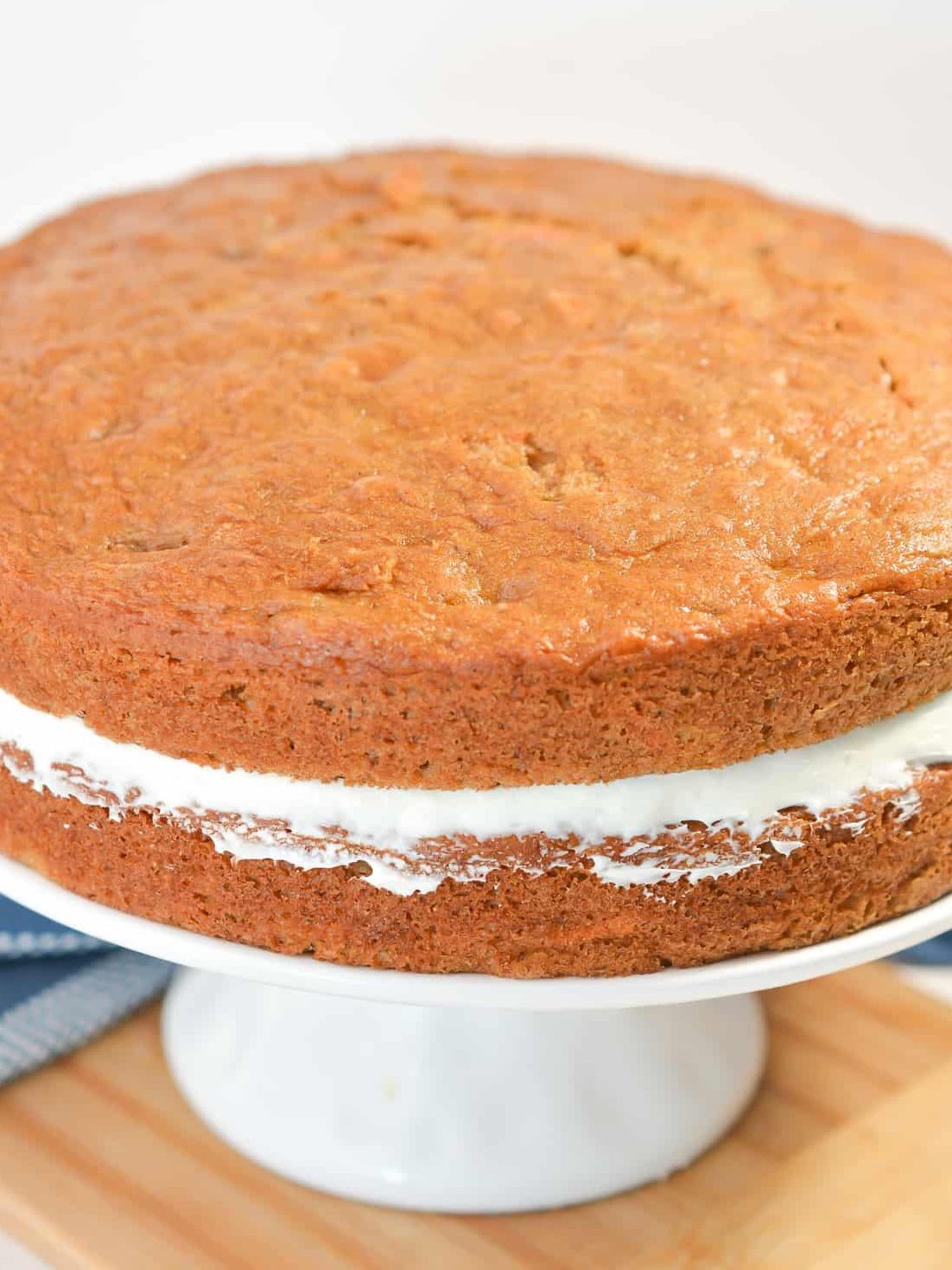 Put the second layer of cake on top, and then ice the top and sides of the cake.