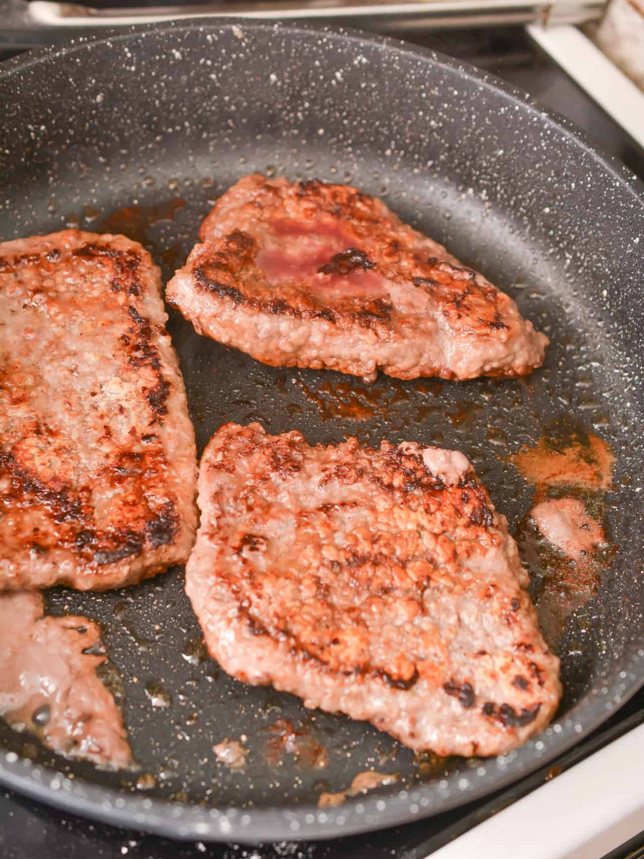 Add the steak to the heated skillet and sear on both sides evenly, cooking until your desired doneness has been reached. Set aside on a plate.