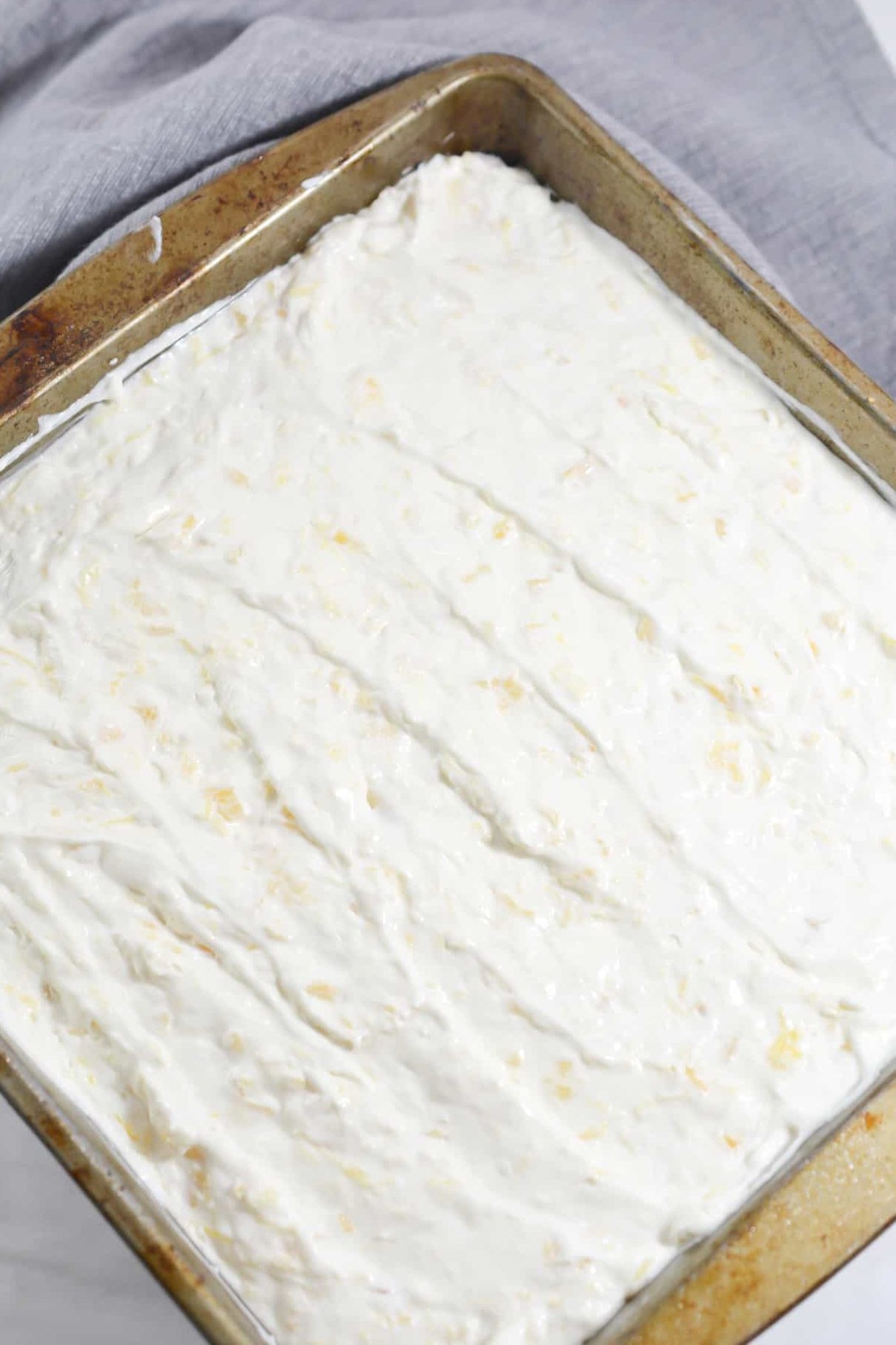 Spread the mixture into the baking dish over the crust.