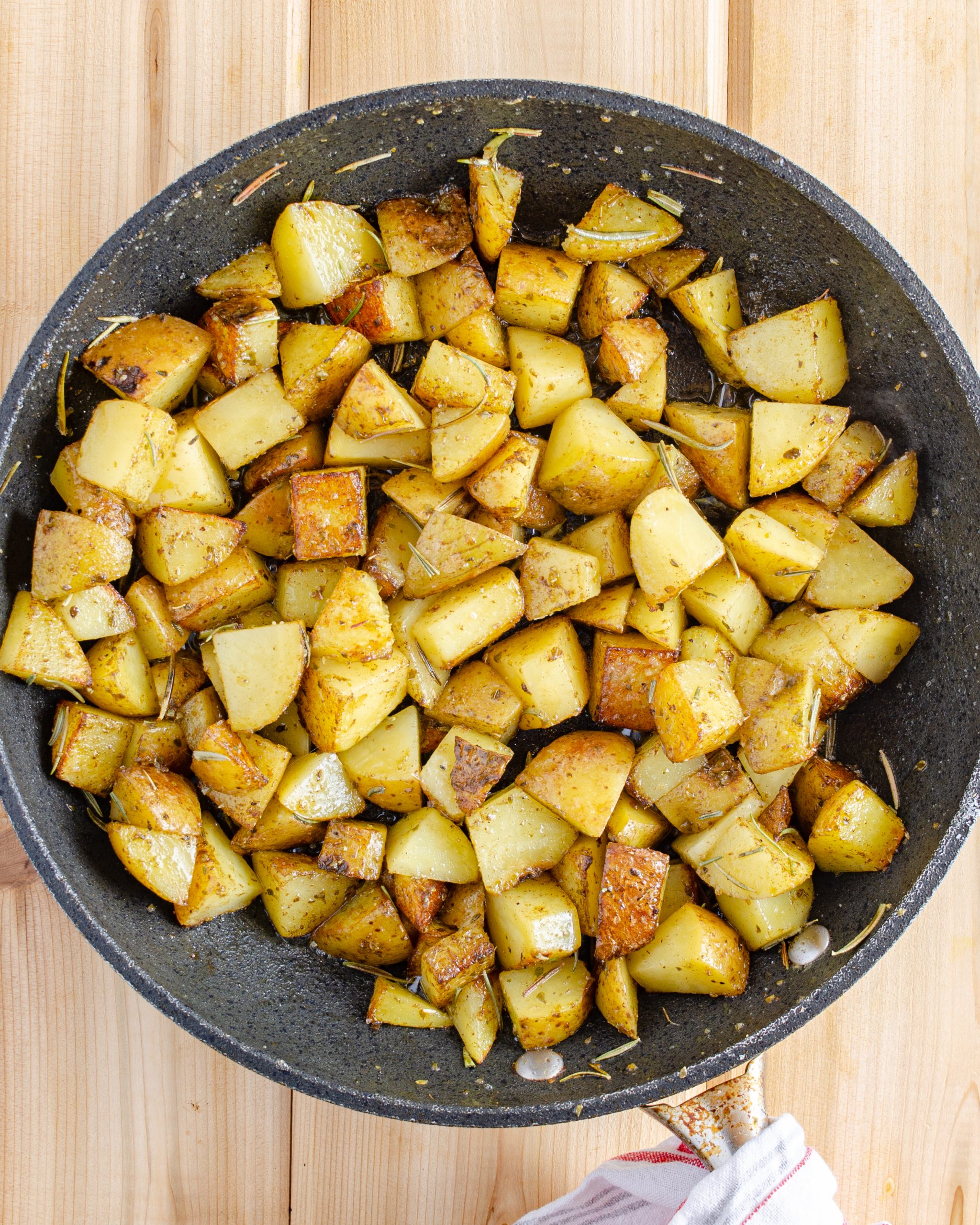 Cook the potatoes until you can easily pierce them with a fork. Then remove the potatoes and set aside.