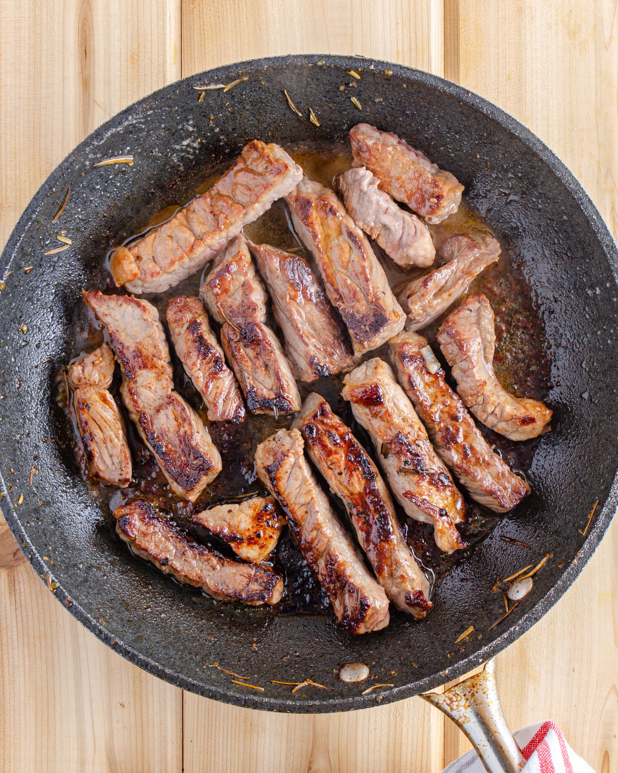 Cook steak strips in the same skillet as you did the potatoes.