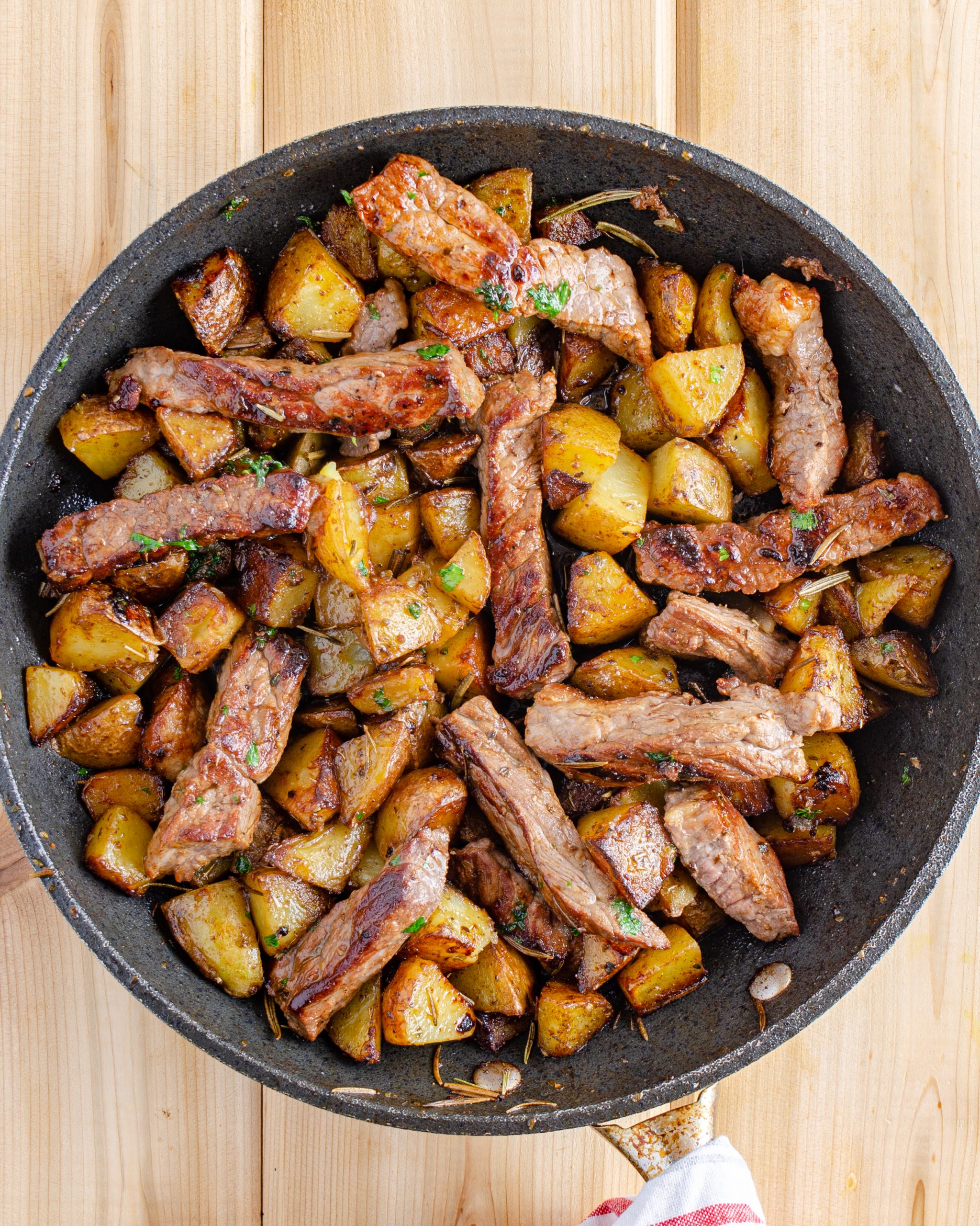 When they've reached the desired doneness, return potatoes to the pan. Once the potatoes are hot, it's time to serve.