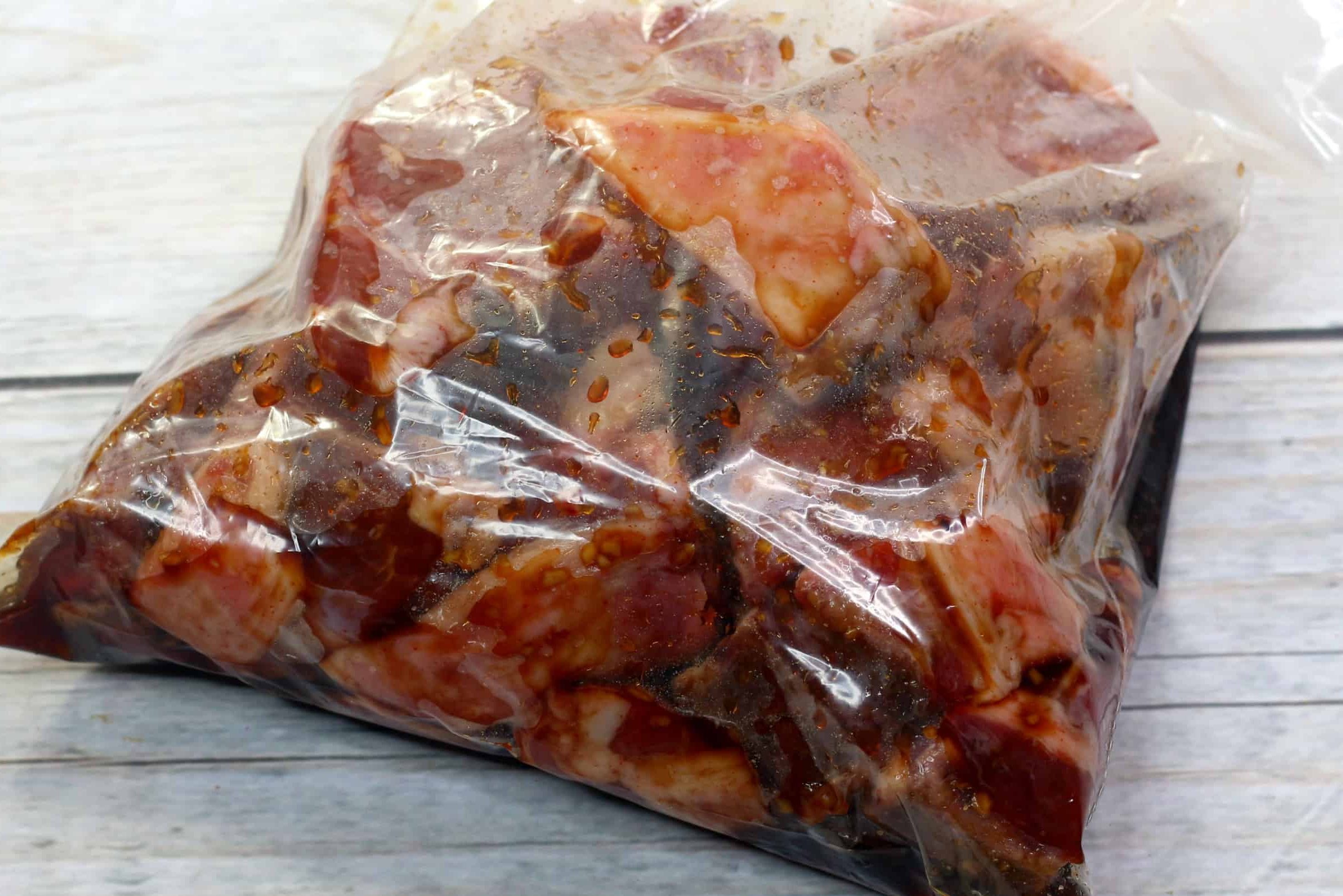 Use a resealable plastic bag and add the lamb chops to it. Then cover them with half of the marinade. 