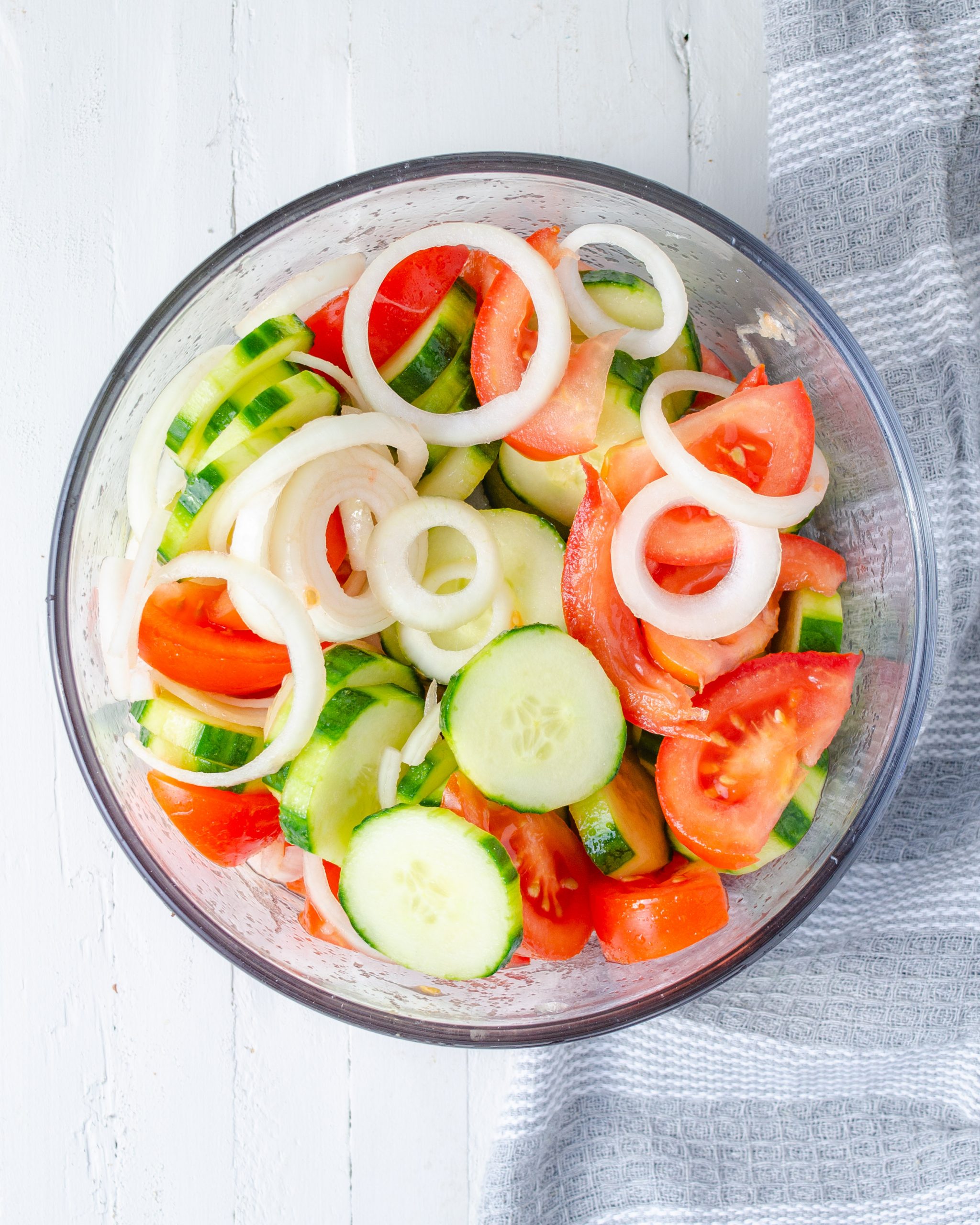 Place the vegetables into a large mixing bowl and toss to combine.