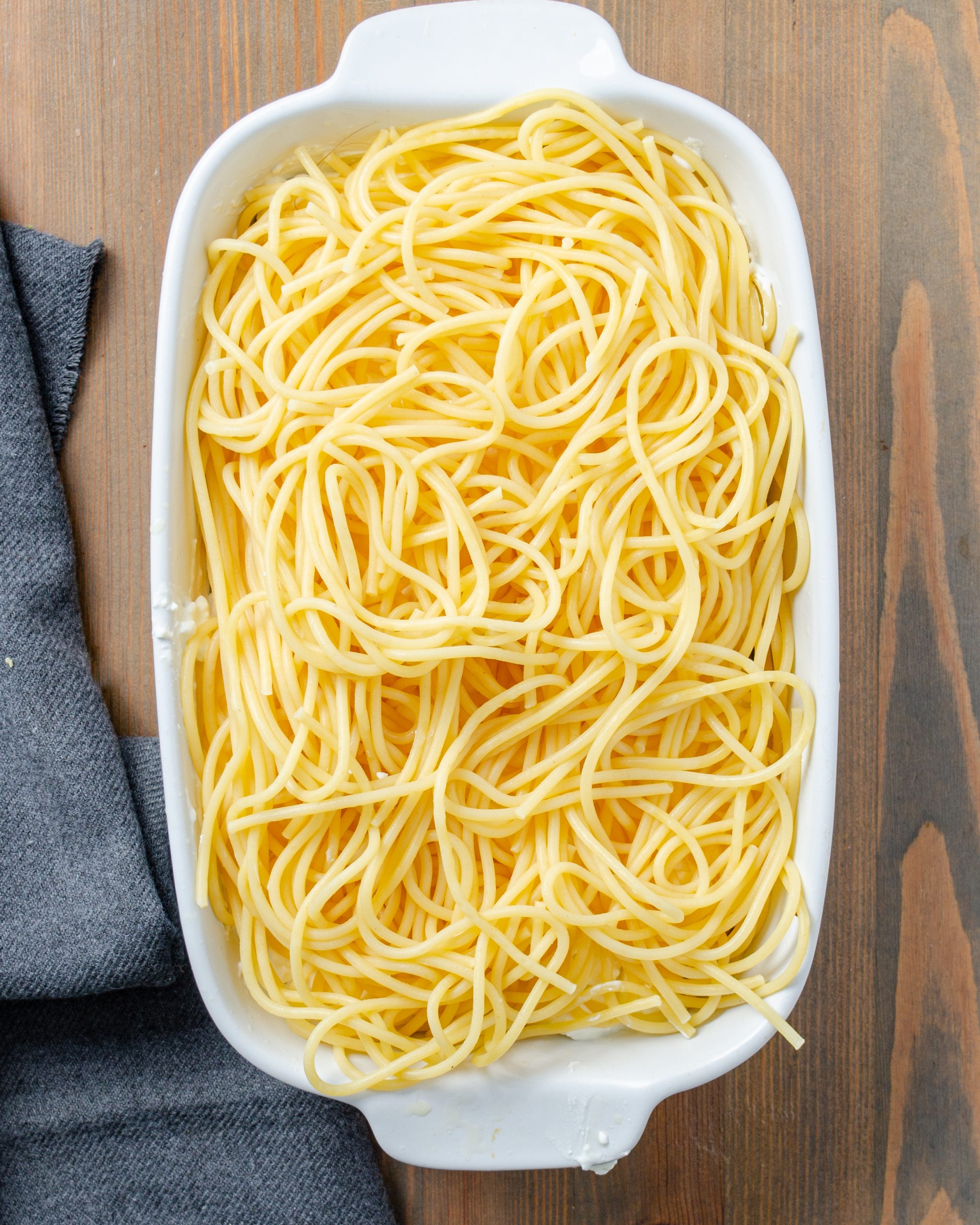 Place the rest of the noodles in a second layer over the cheese mixture.
