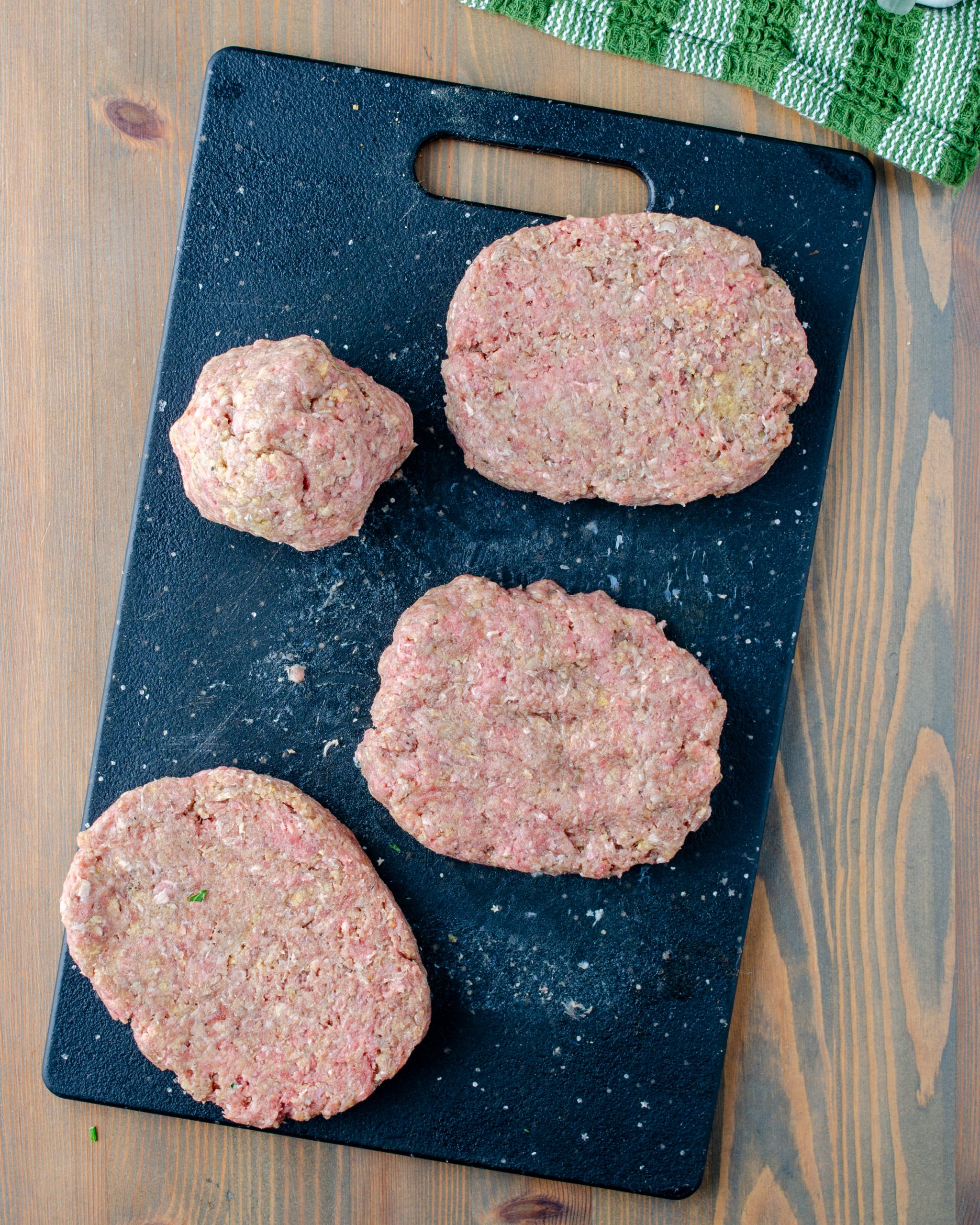 Make the ground beef into 4 individual oval patties