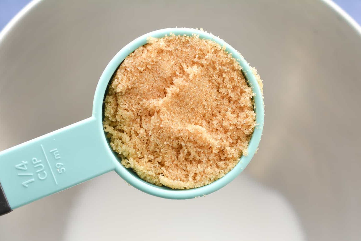 Add 1 cup of granulated sugar, and 1 cup of brown sugar to a mixing bowl.