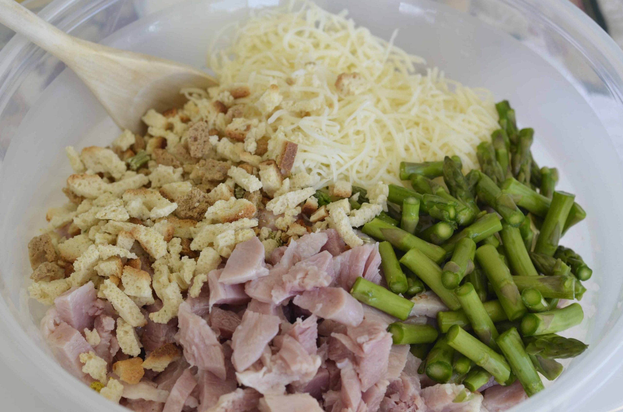 mixing ingredients for ham casserole