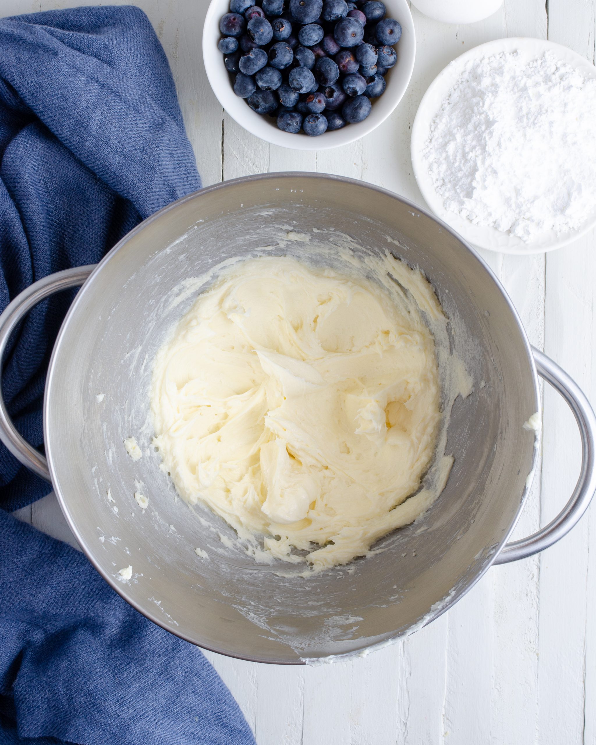 Blend together the creamy cheese, granulated sugar, and lemon juice in a mixing bowl until smooth.