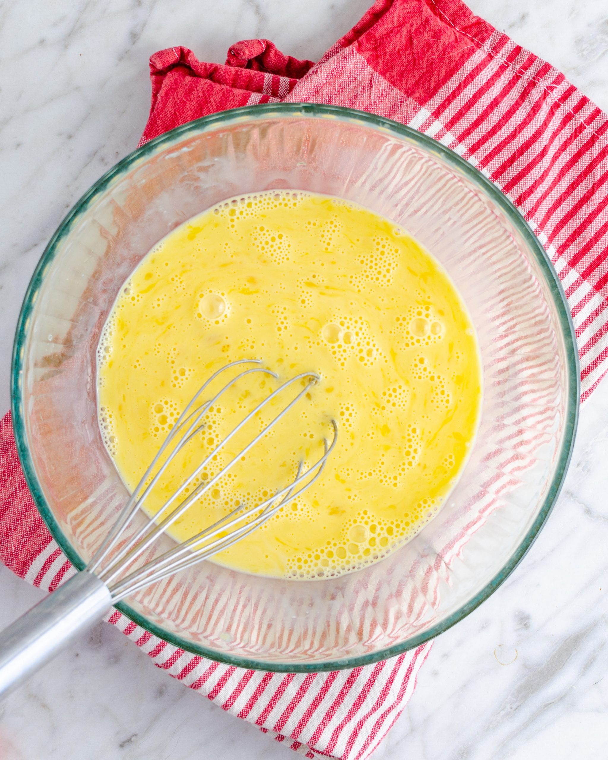 In a bowl, whisk together the eggs and milk until well combined.