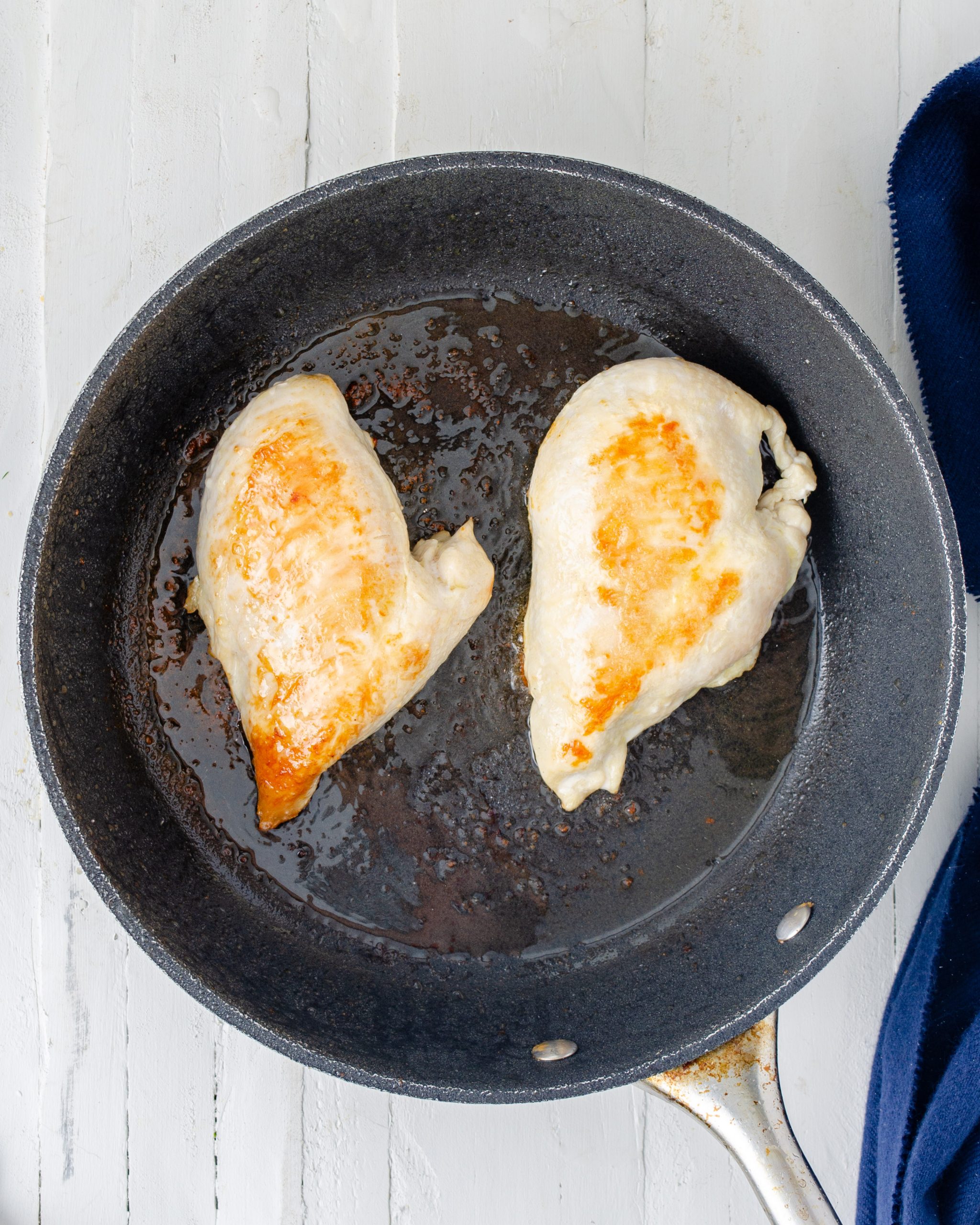 Cook the chicken in the butter in a skillet over medium-high heat for 5-6 minutes.