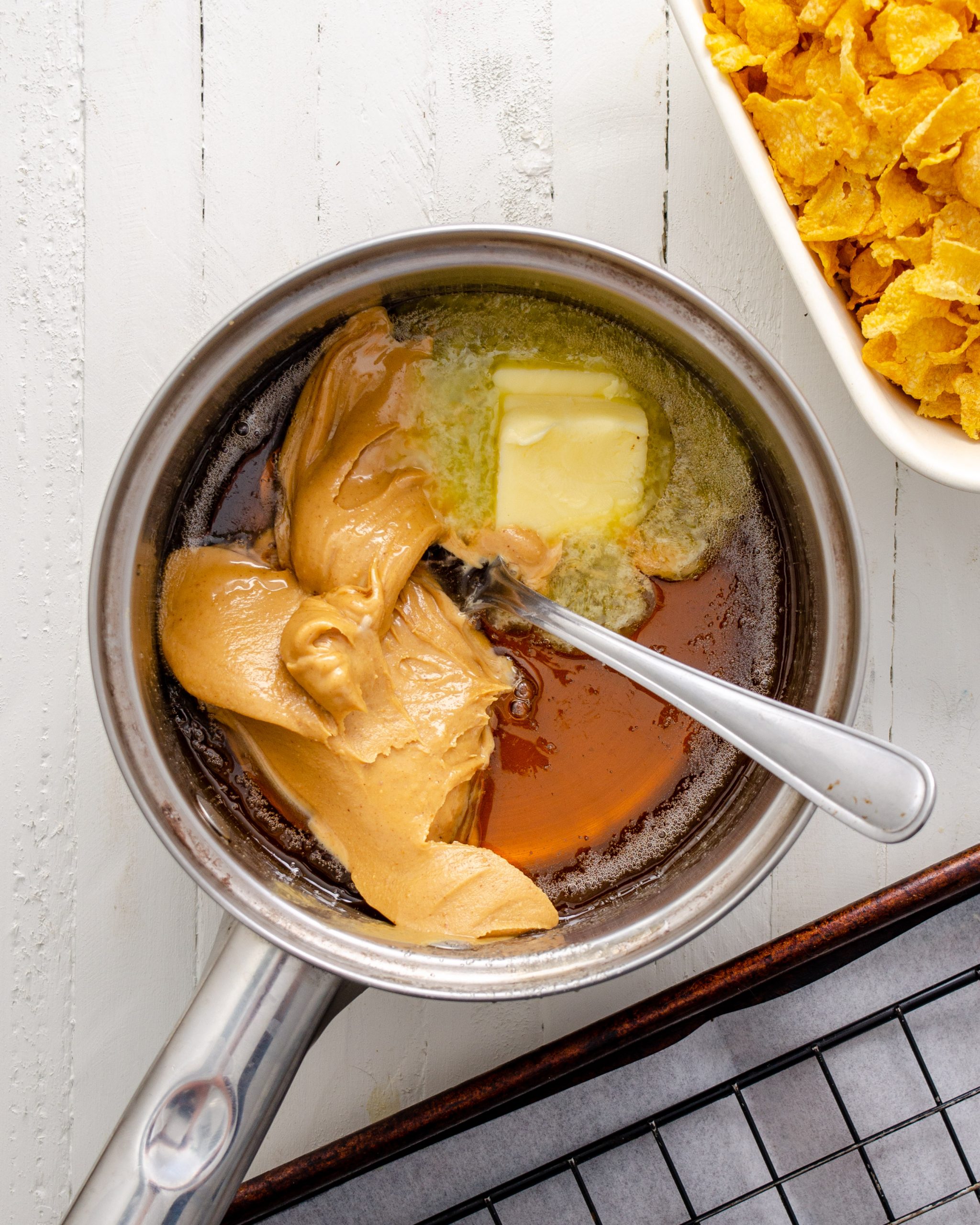 Add together the butter and peanut butter.