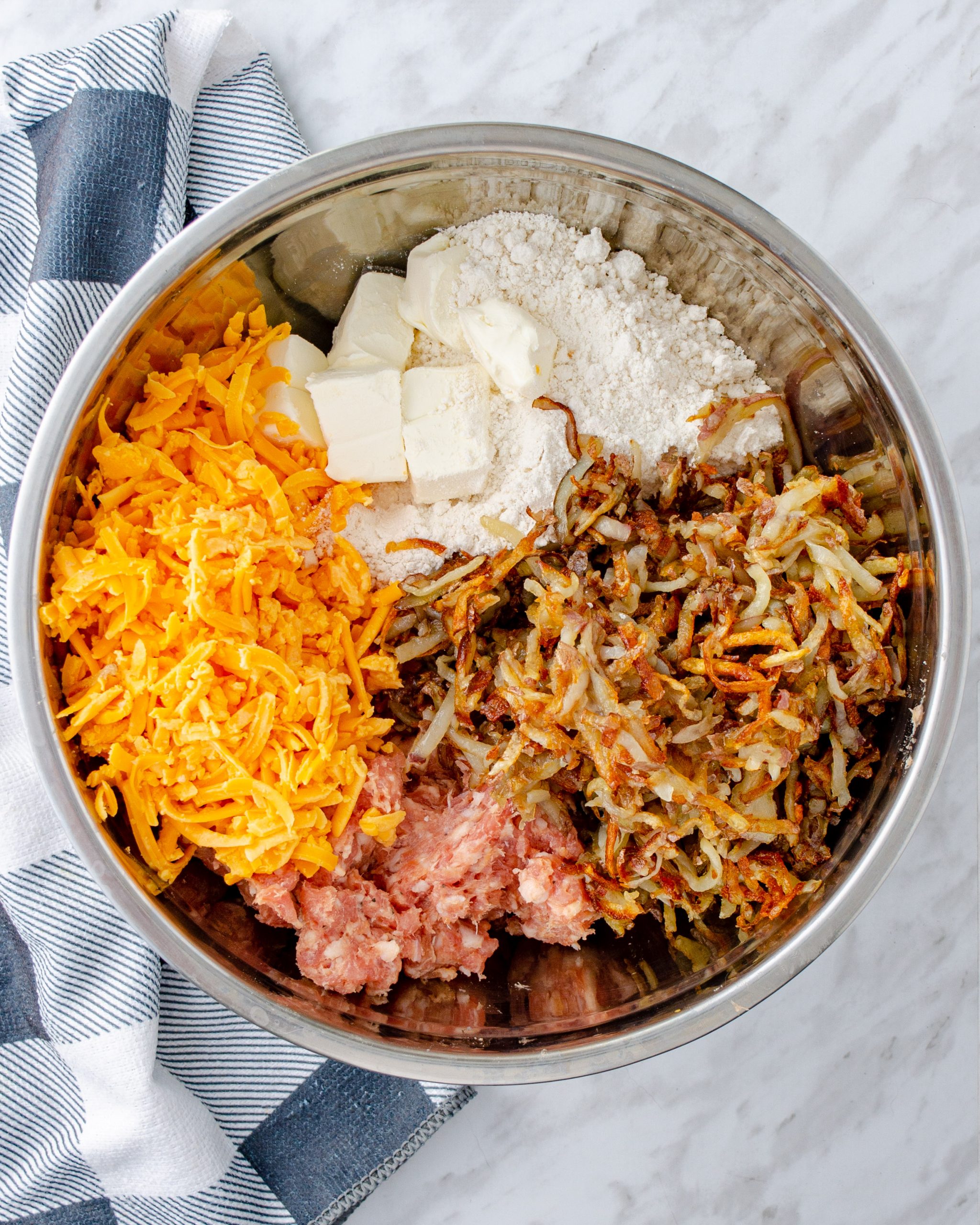  Combine all of the ingredients in a large mixing bowl.
