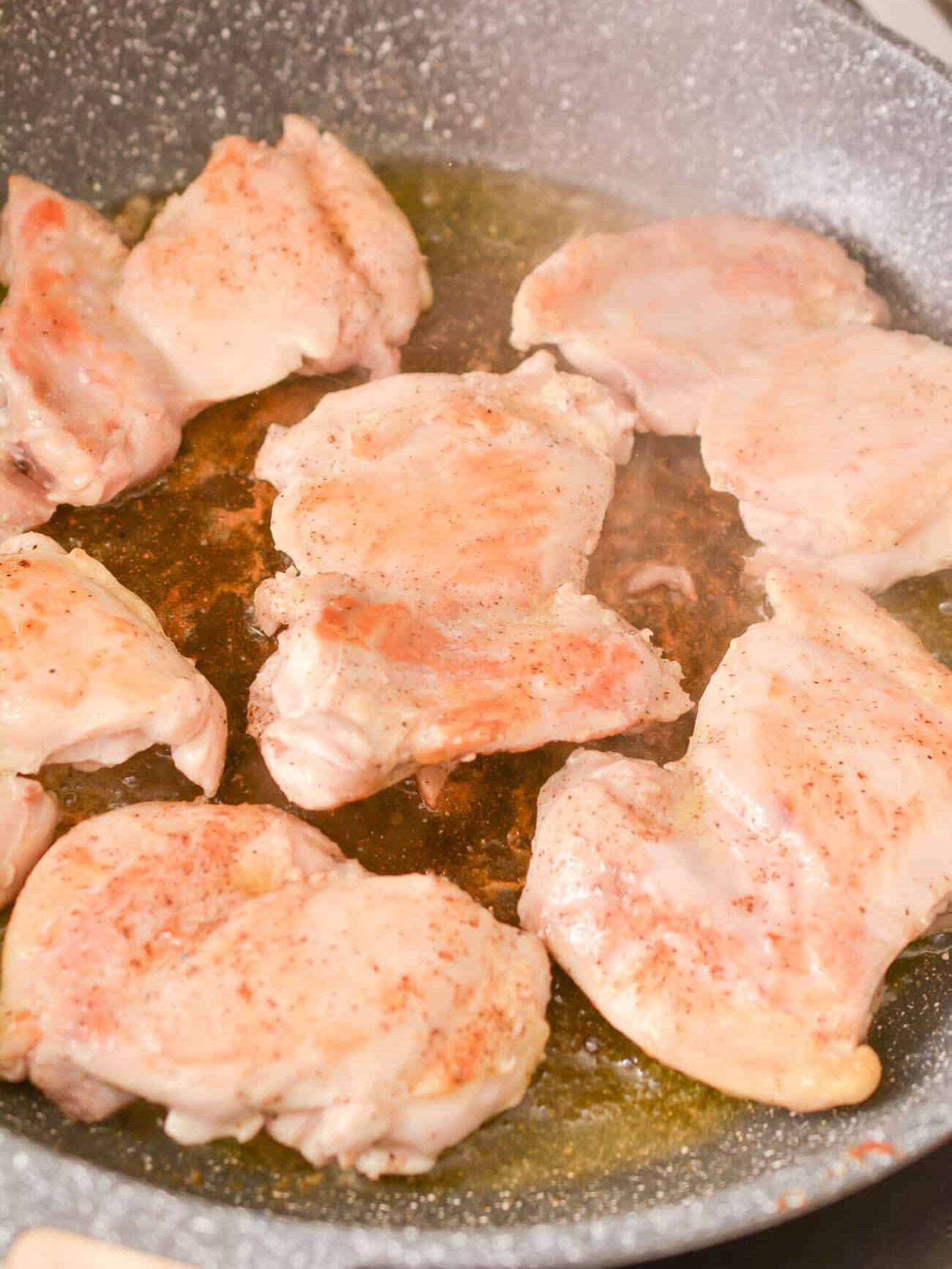 Season the chicken with salt and pepper, and sear on both sides in a skillet with olive oil.