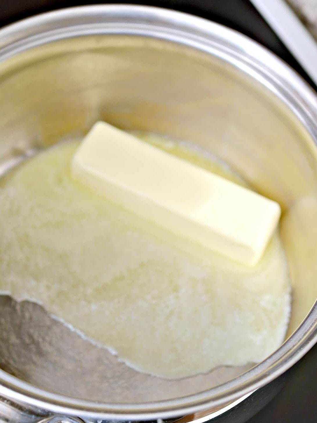 In a saucepan over medium-high heat on the stove, add 8 tbsp butter.