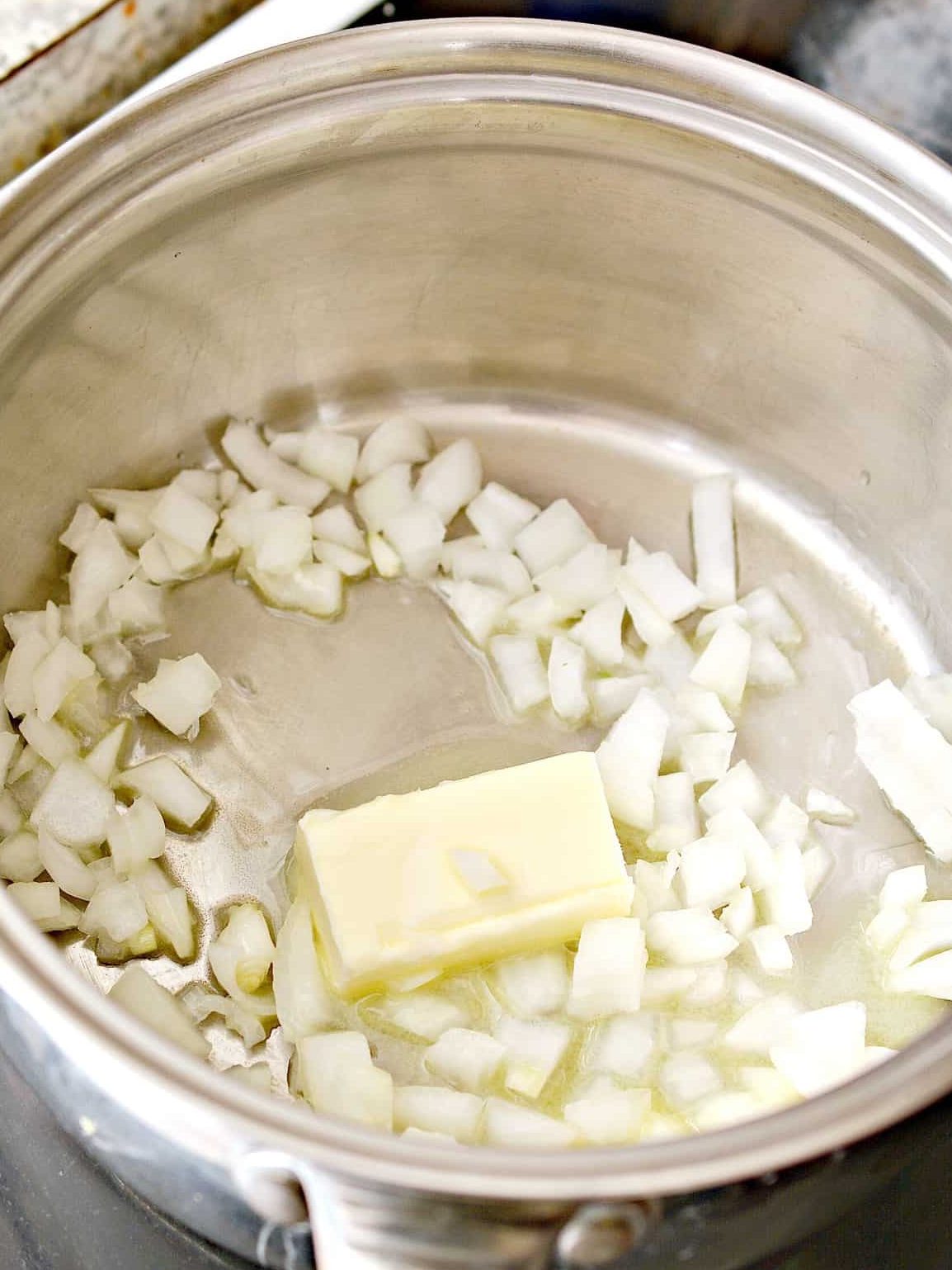 Add the onions to the melted butter, and cook until they begin to soften.