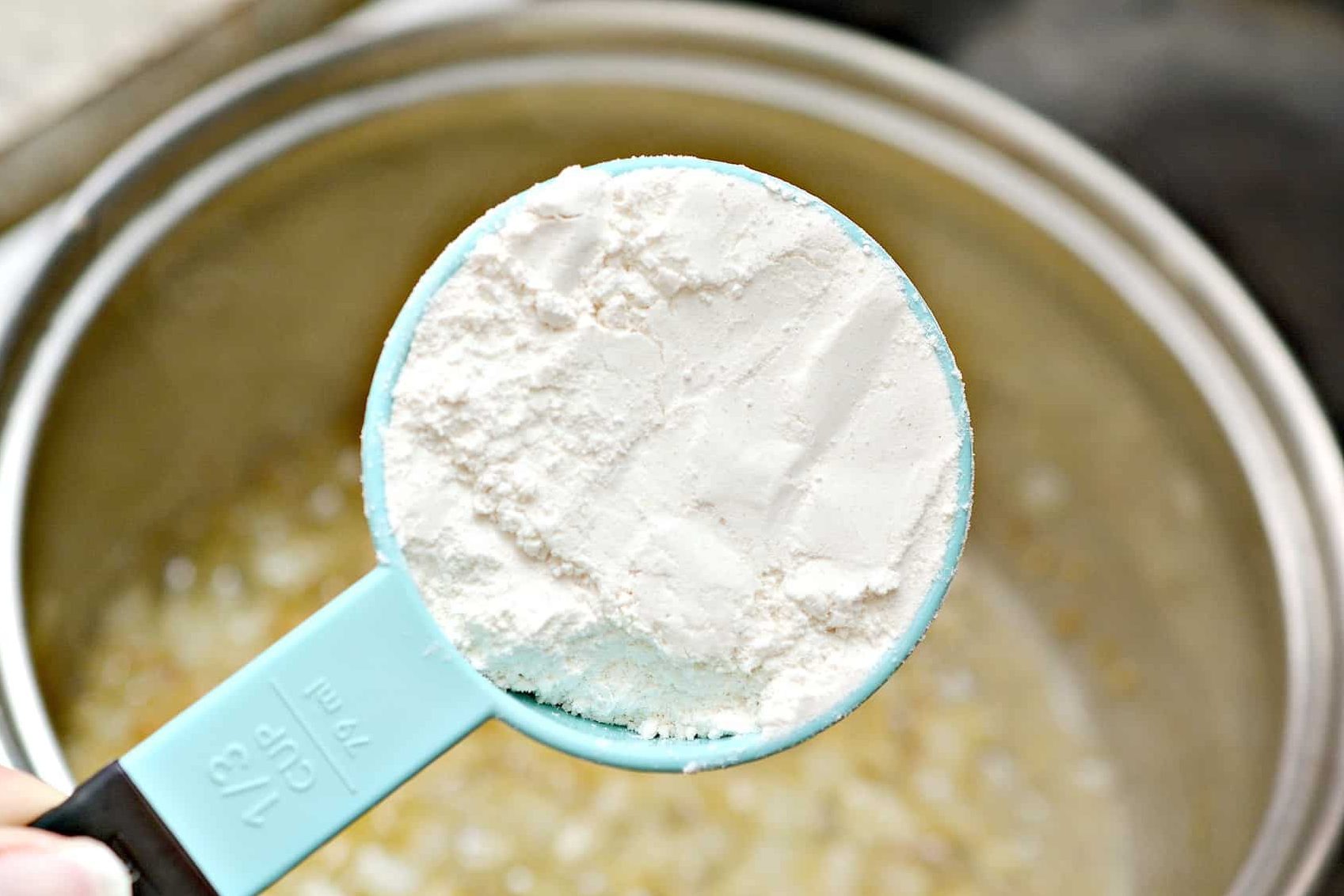 Place the flour in the skillet, and stir to combine, cooking for 1 minute.