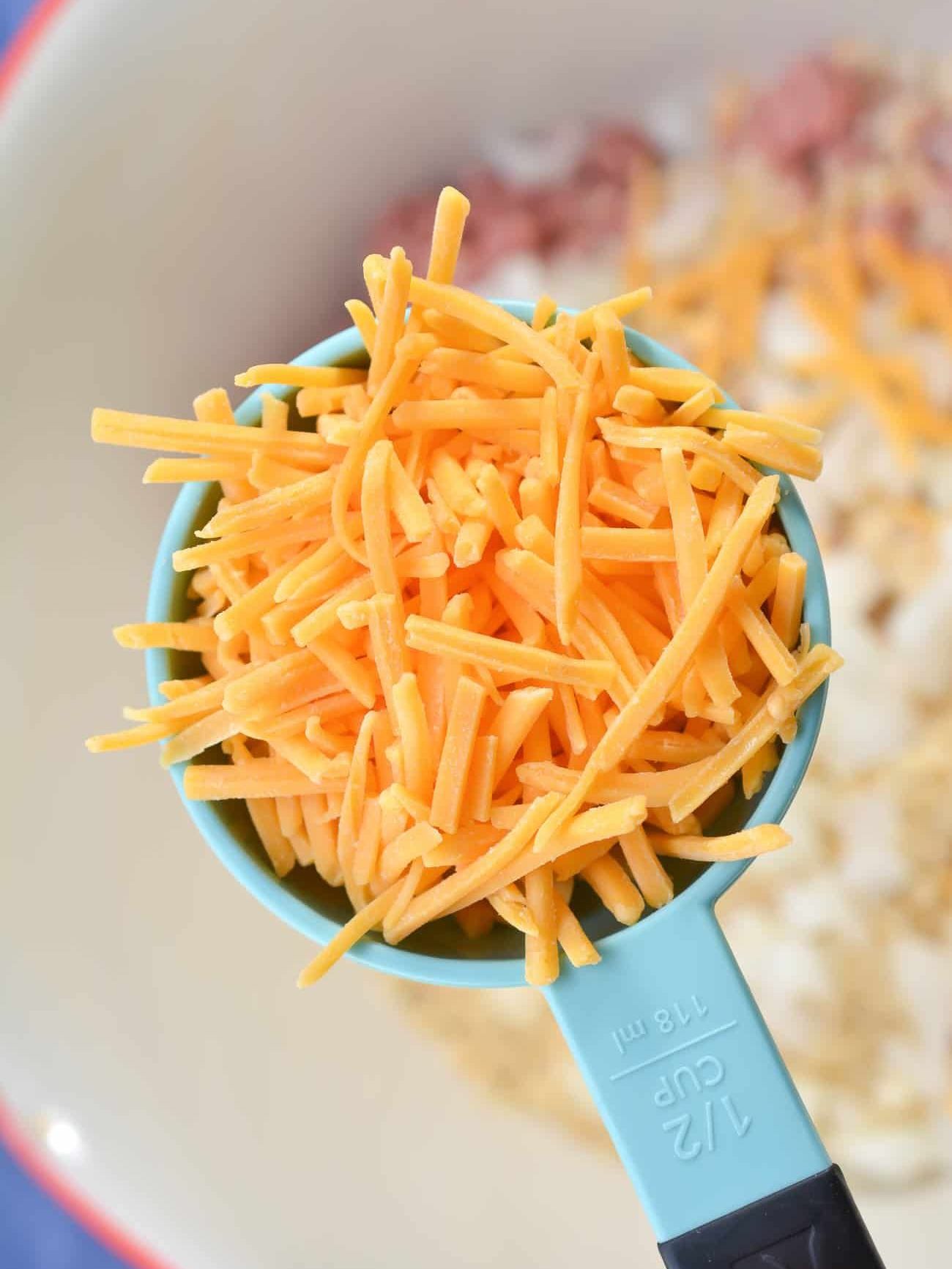 add ½ cup of shredded cheddar cheese.