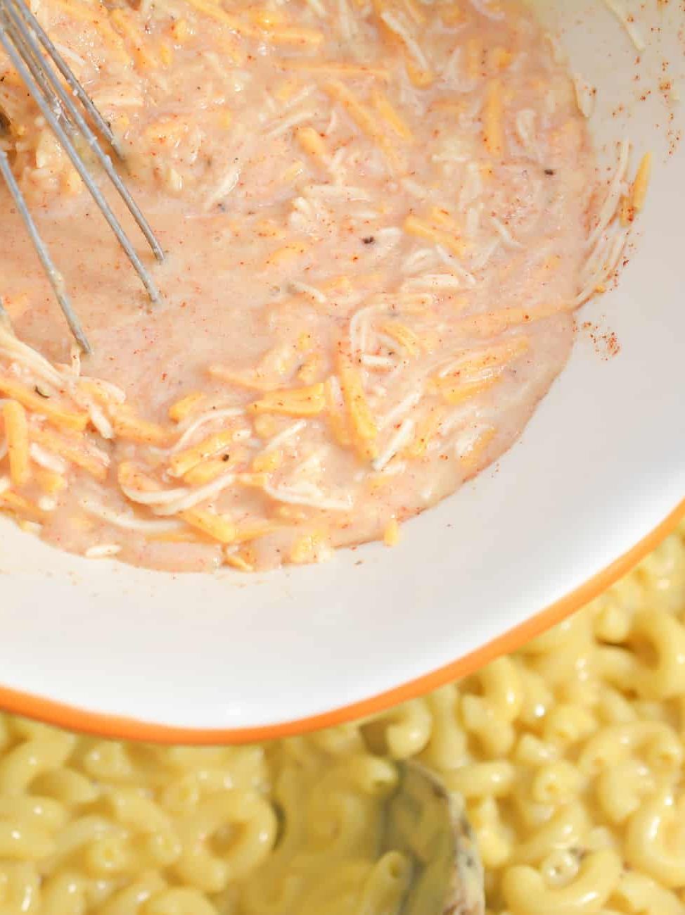 Pour this mixture into the macaroni, and stir to combine well.
