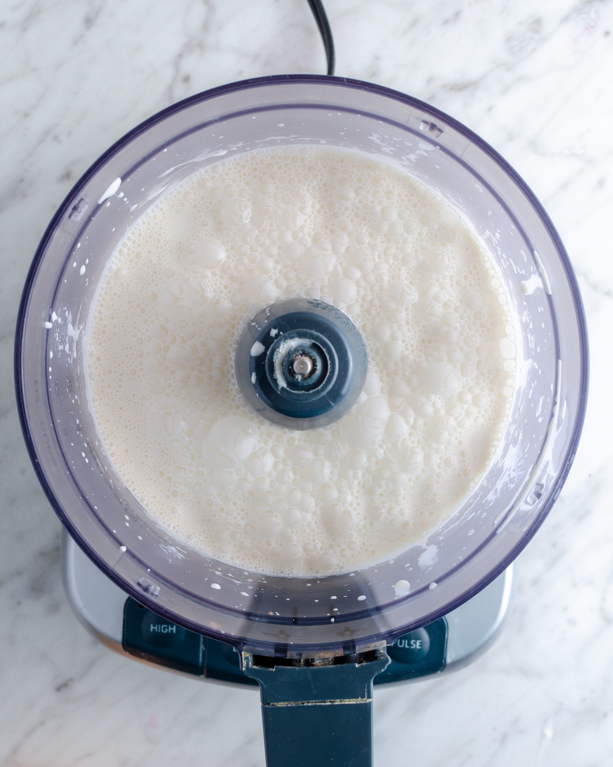 Combine the vanilla, heavy whipping cream, and sugar in a blender or food processor. Pulse until well combined. 