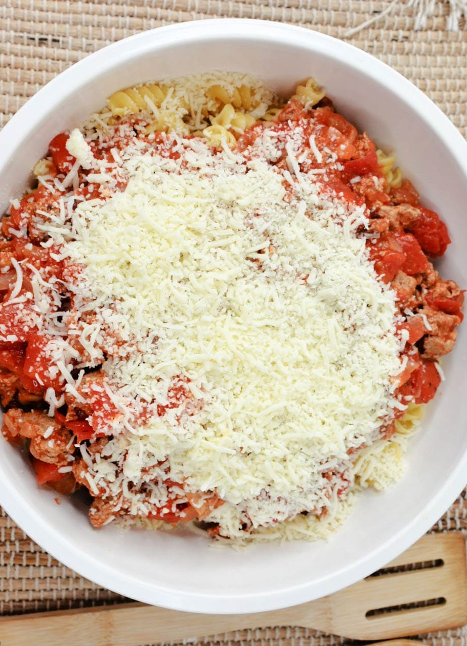 Add to a large bowl. Add one cup of shredded cheese and 16 pieces of turkey pepperoni.