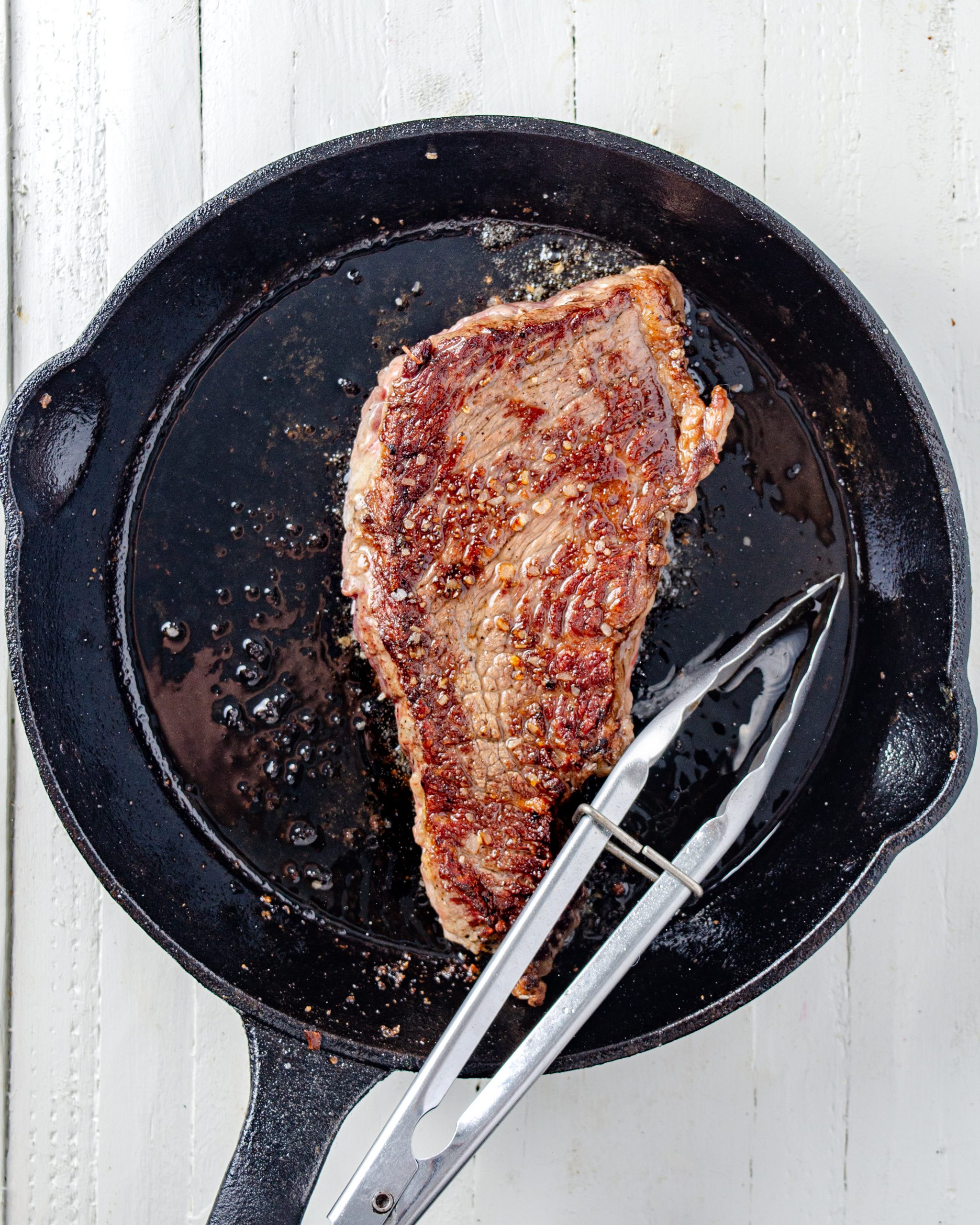 Sear the steak well on both sides, and cook until done to your liking.