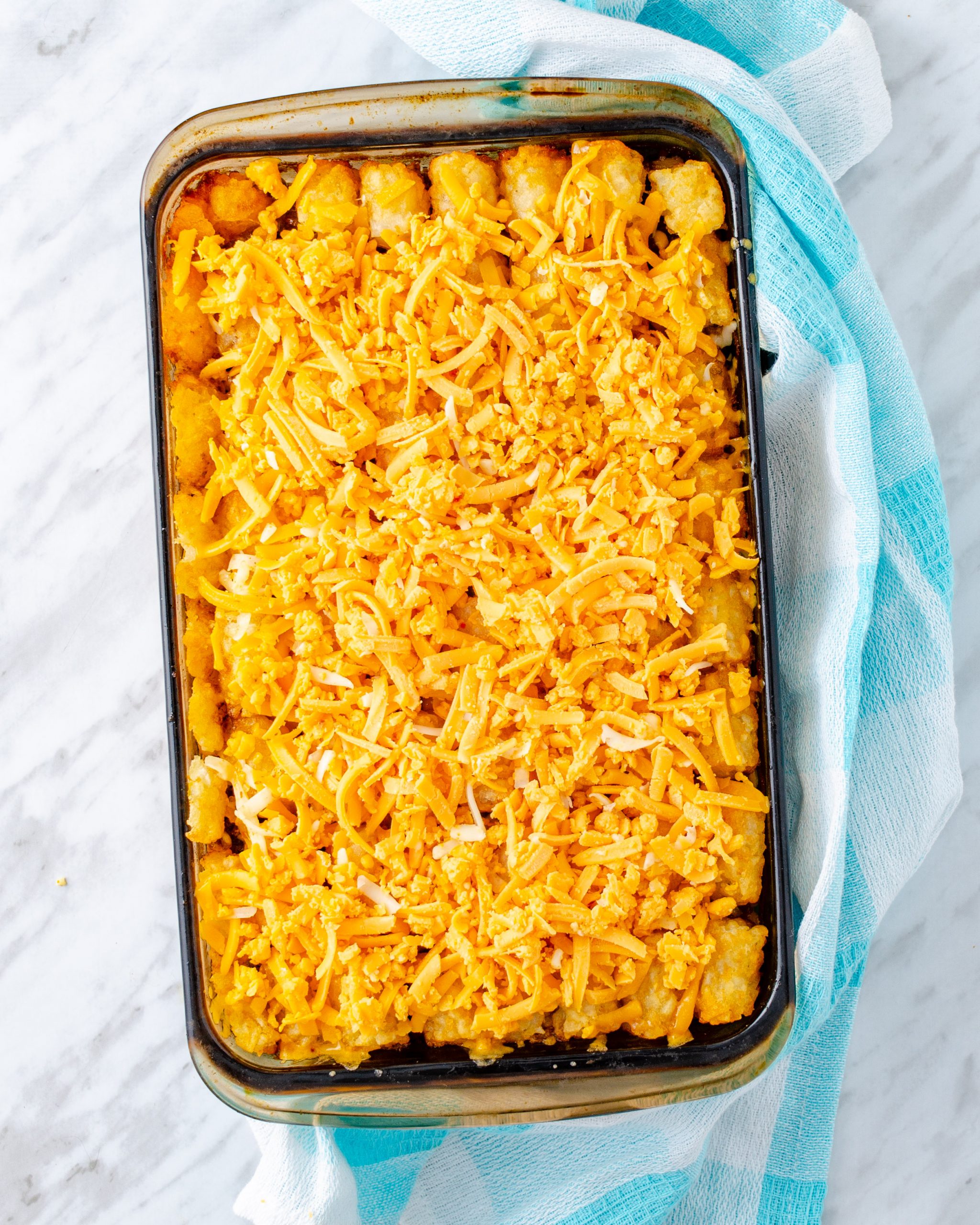 Remove from the oven, top with the shredded cheese