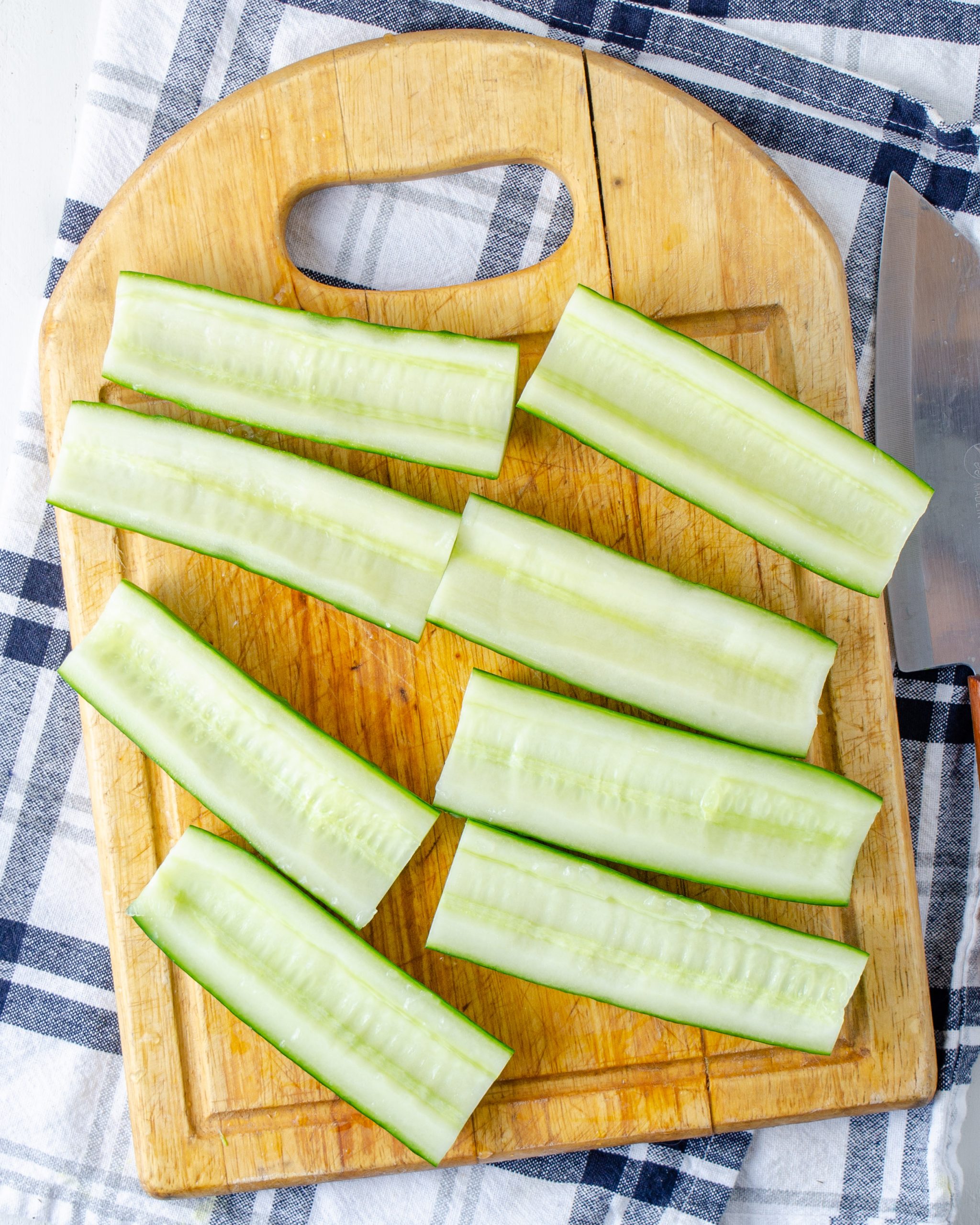 Then cut in half again the other way, so that each cucumber half created two slices of “bread” for each sandwich. 