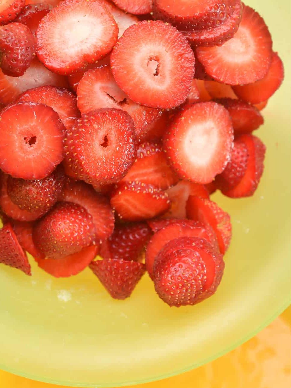 add 1 Pint of strawberries sliced into the mixing bowl.