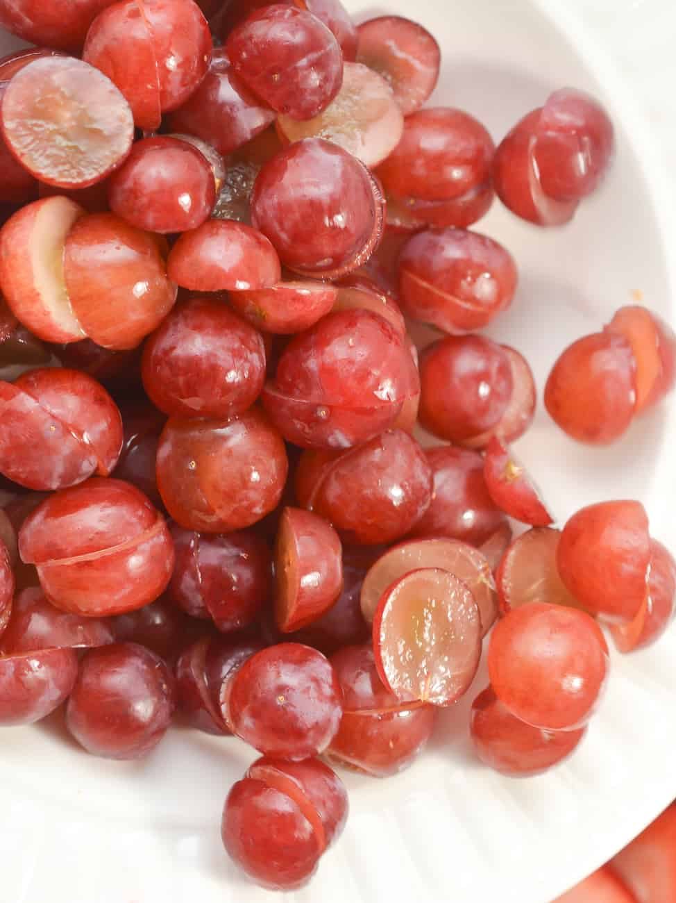 add 1 bunch of red grapes cut in half.