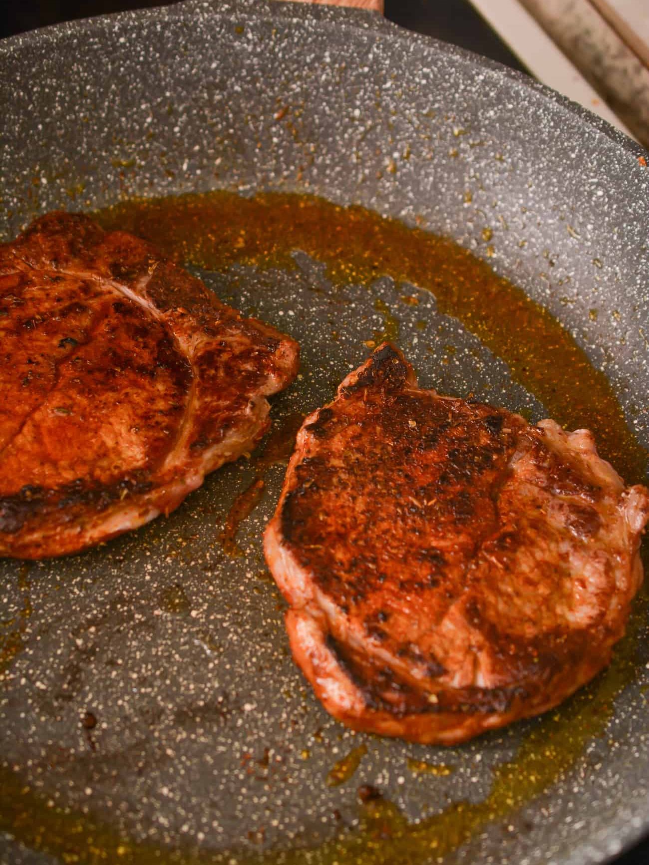 Heat some oil in a skillet over medium-high heat and cook the steak until done to your liking. Let rest, and then cut into pieces.