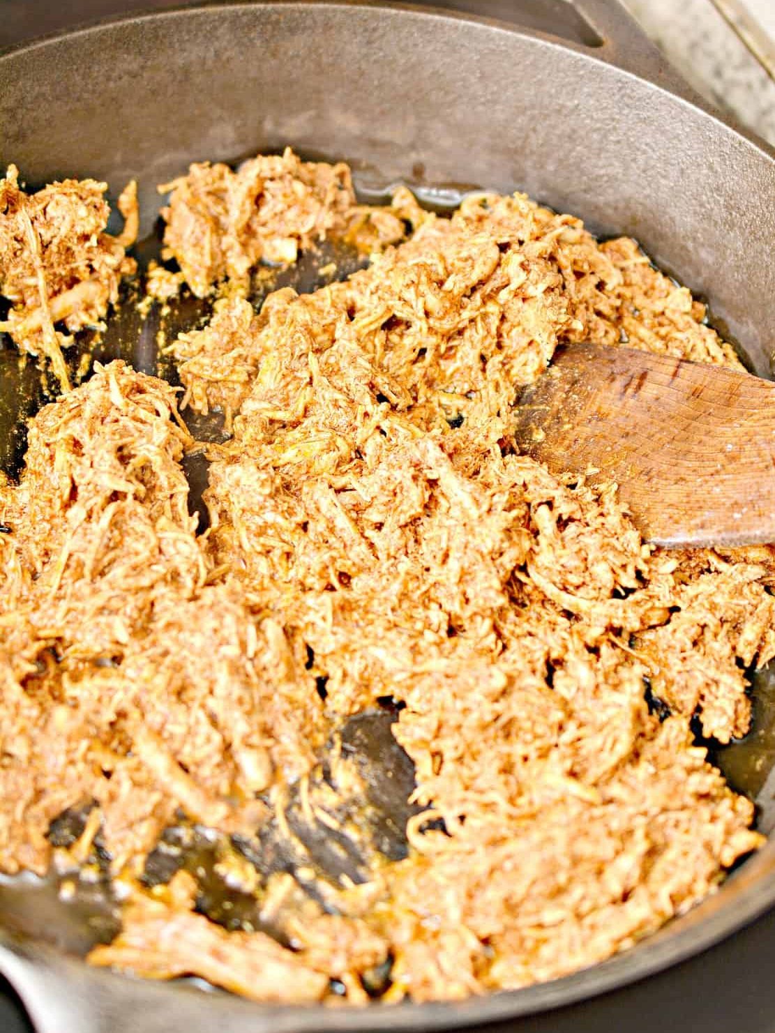 Add the shredded chicken and ¼ cup of the enchilada sauce to the skillet, and stir to combine.