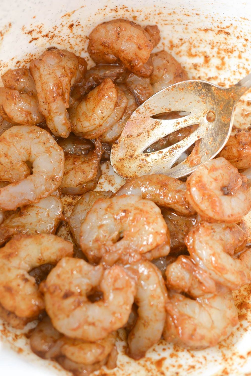 In a bowl, coat the shrimp in olive oil and Old Bay seasoning. Mix to combine.