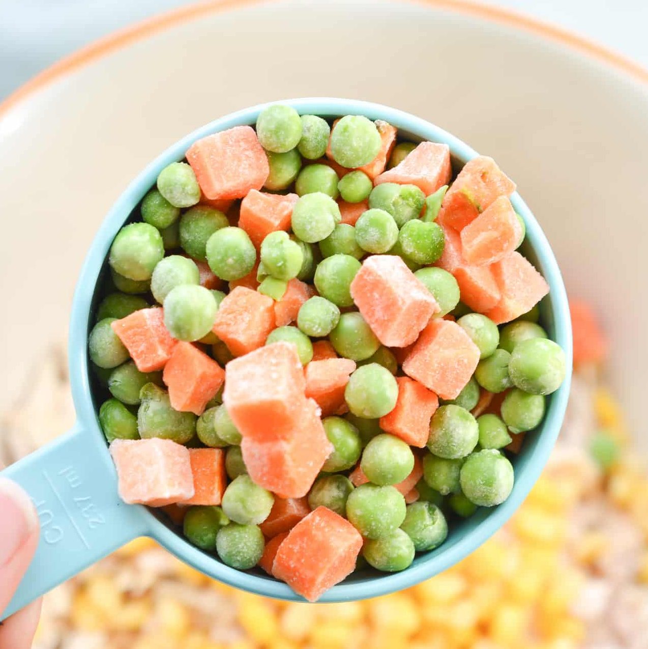 add 1 cup of frozen peas and carrots.
