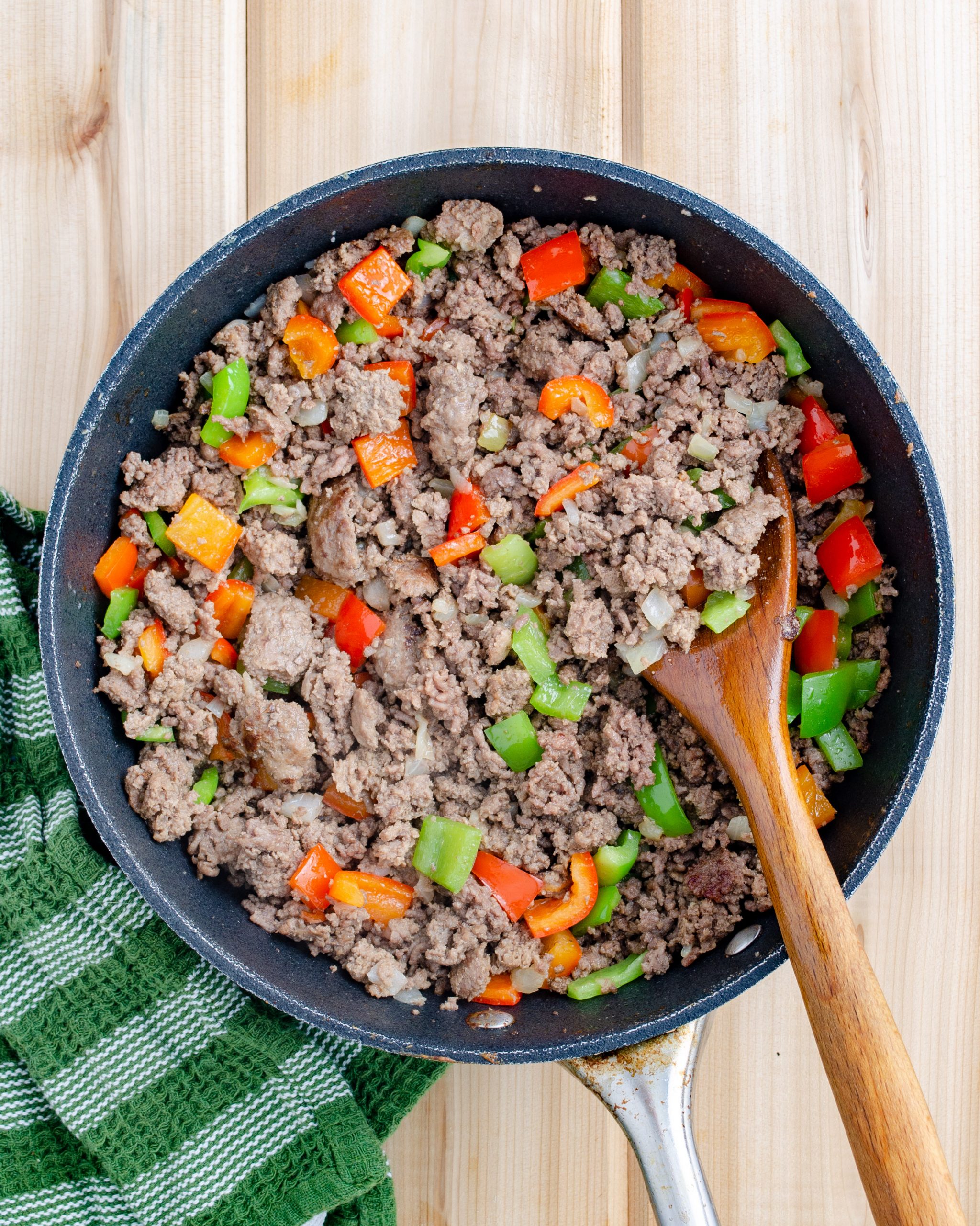 Saute until the vegetables have softened. Drain any excess fat, and season with salt and pepper to taste.