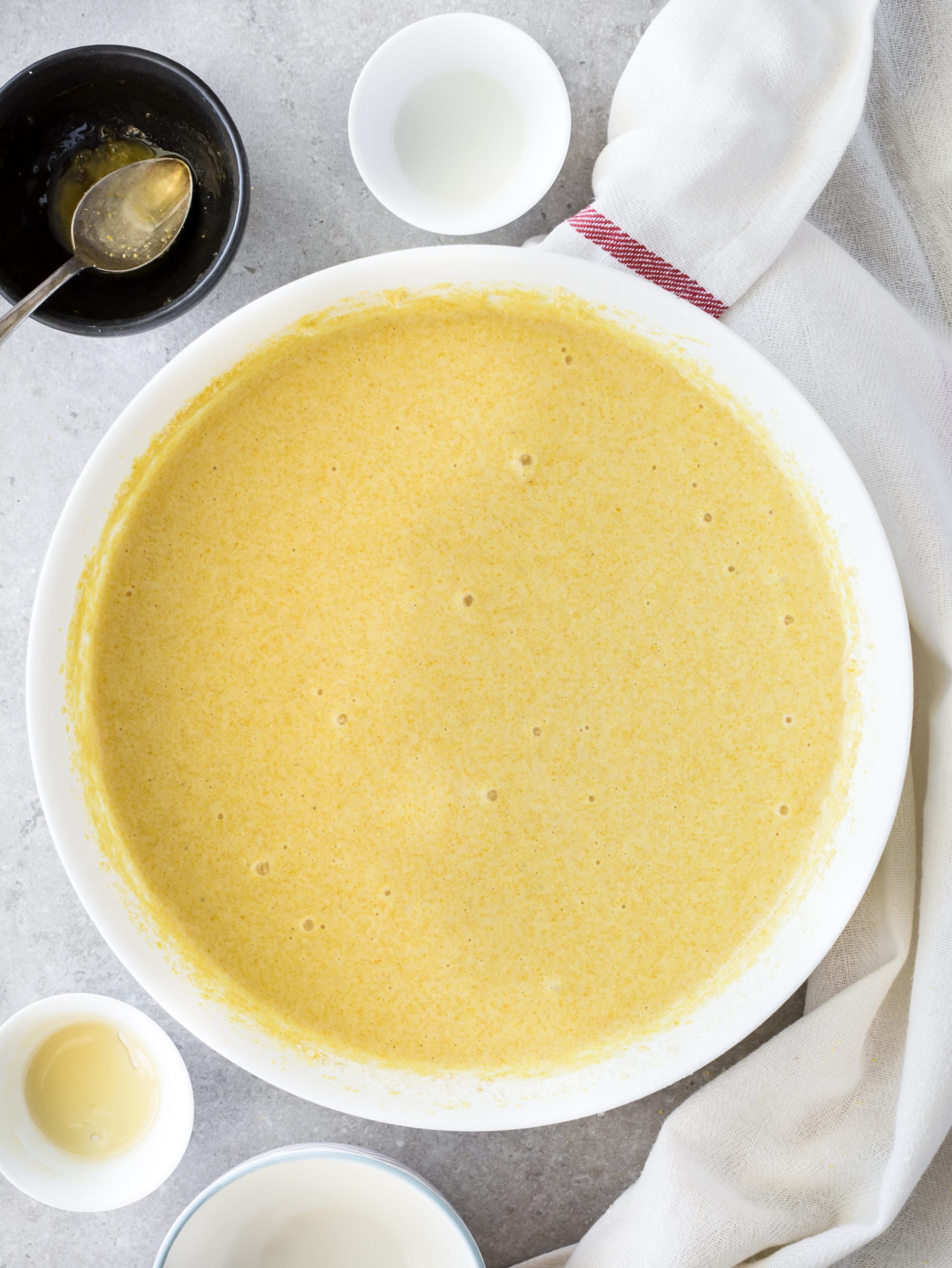 Blend the egg, buttermilk, honey, and vegetable oil into the dry ingredients. 