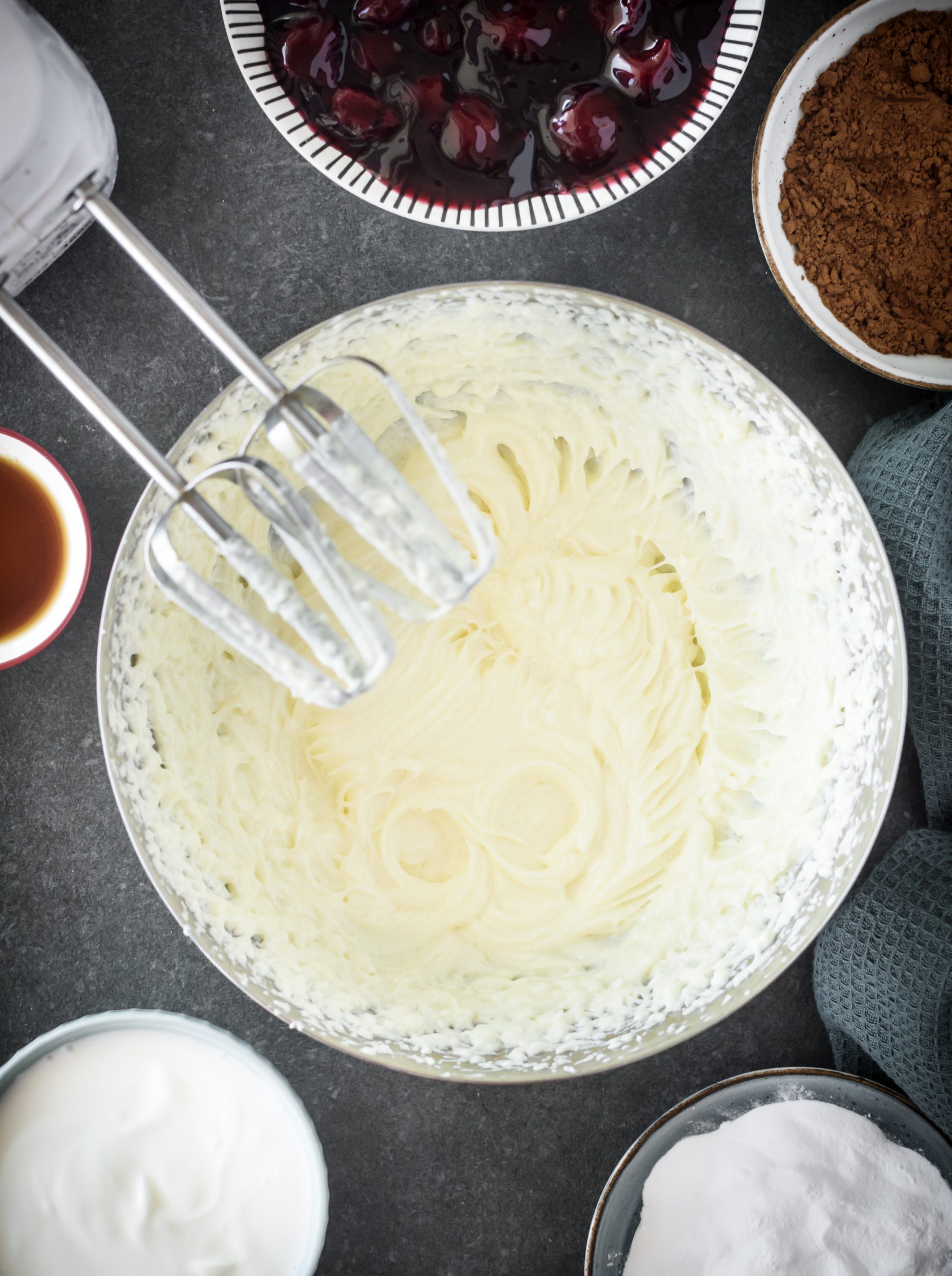 Blend together the sugar and cream cheese in a bowl until smooth. 