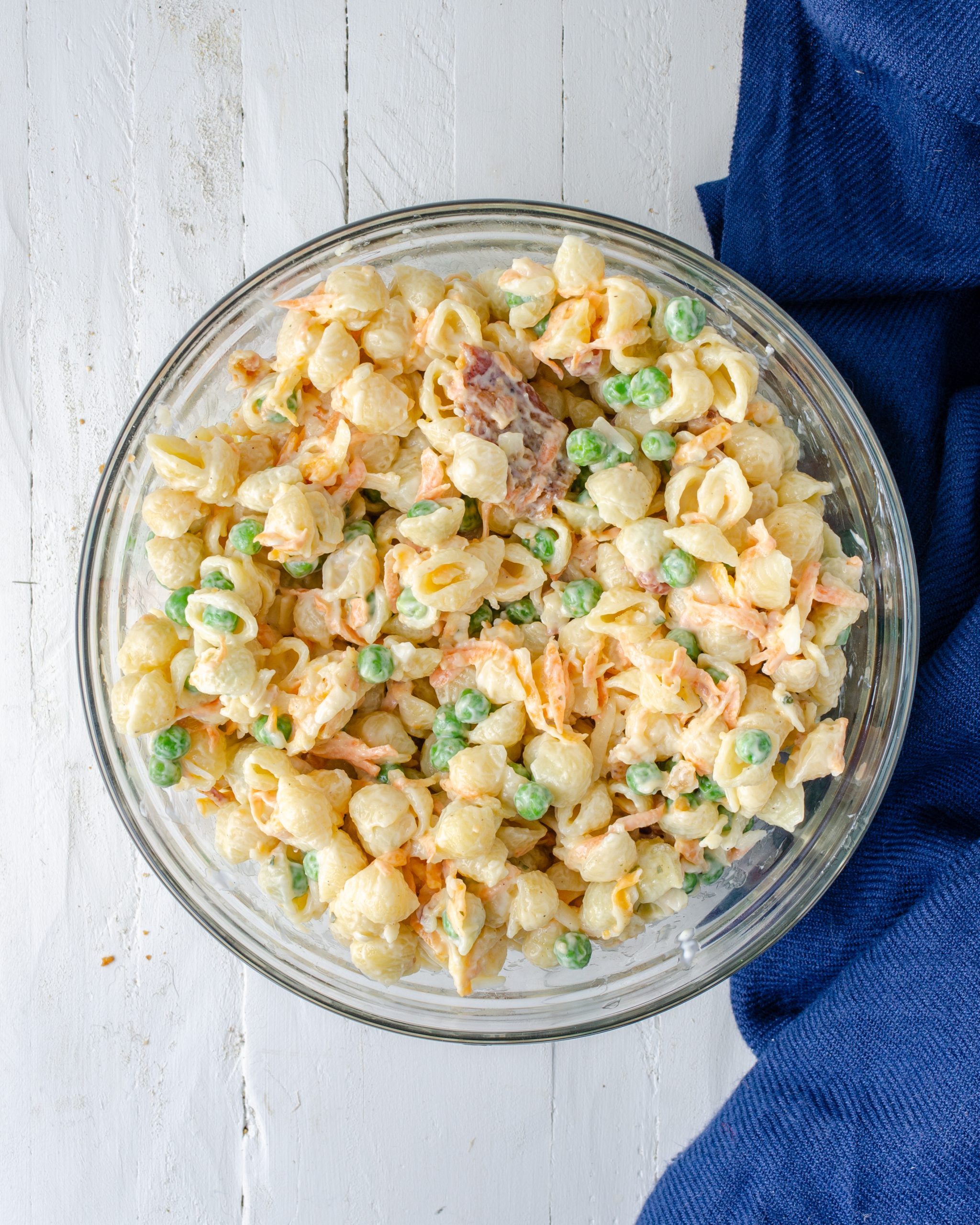 Sprinkle with the remaining cheese and bacon and serve.