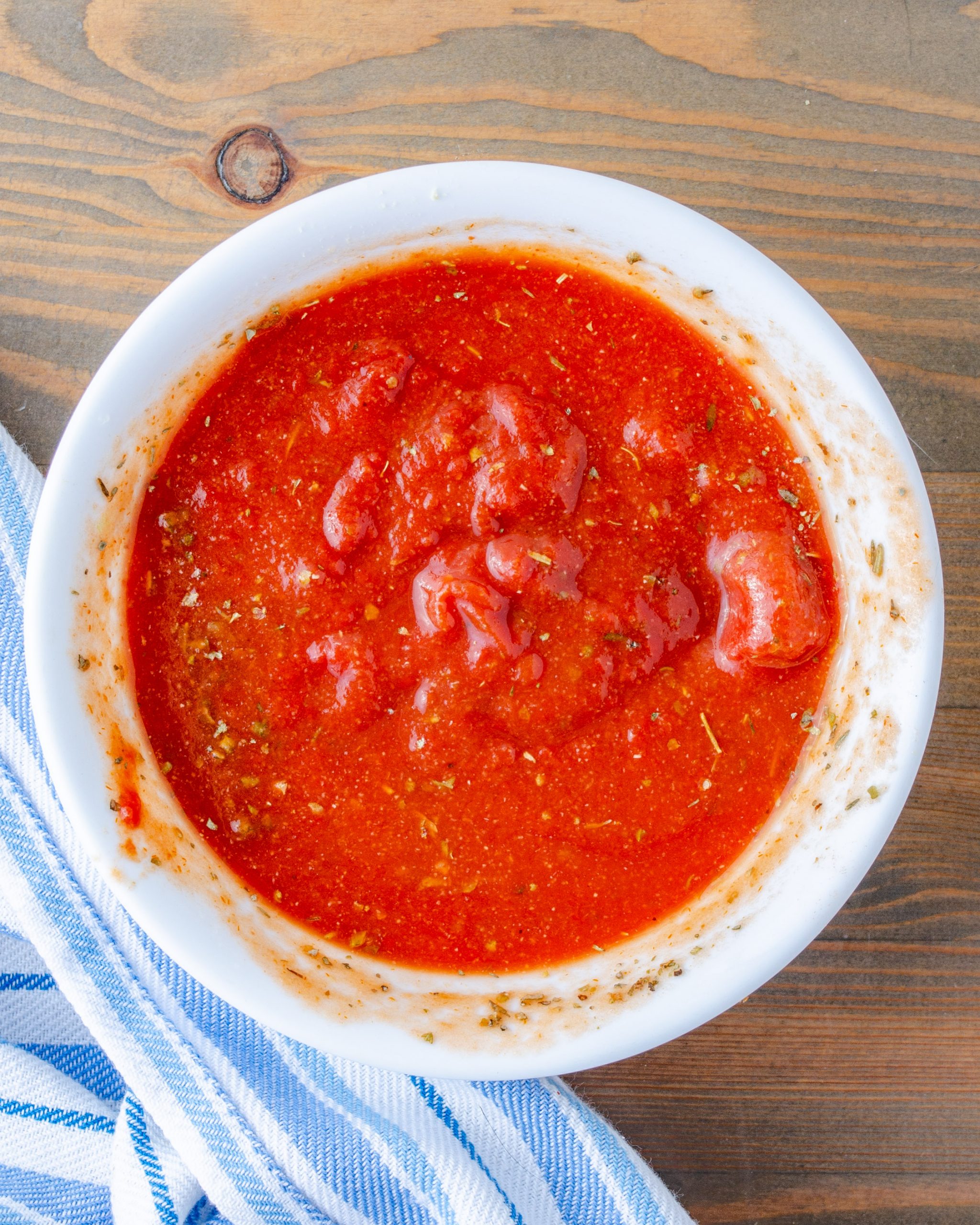 whisk together the water, and tomato paste.