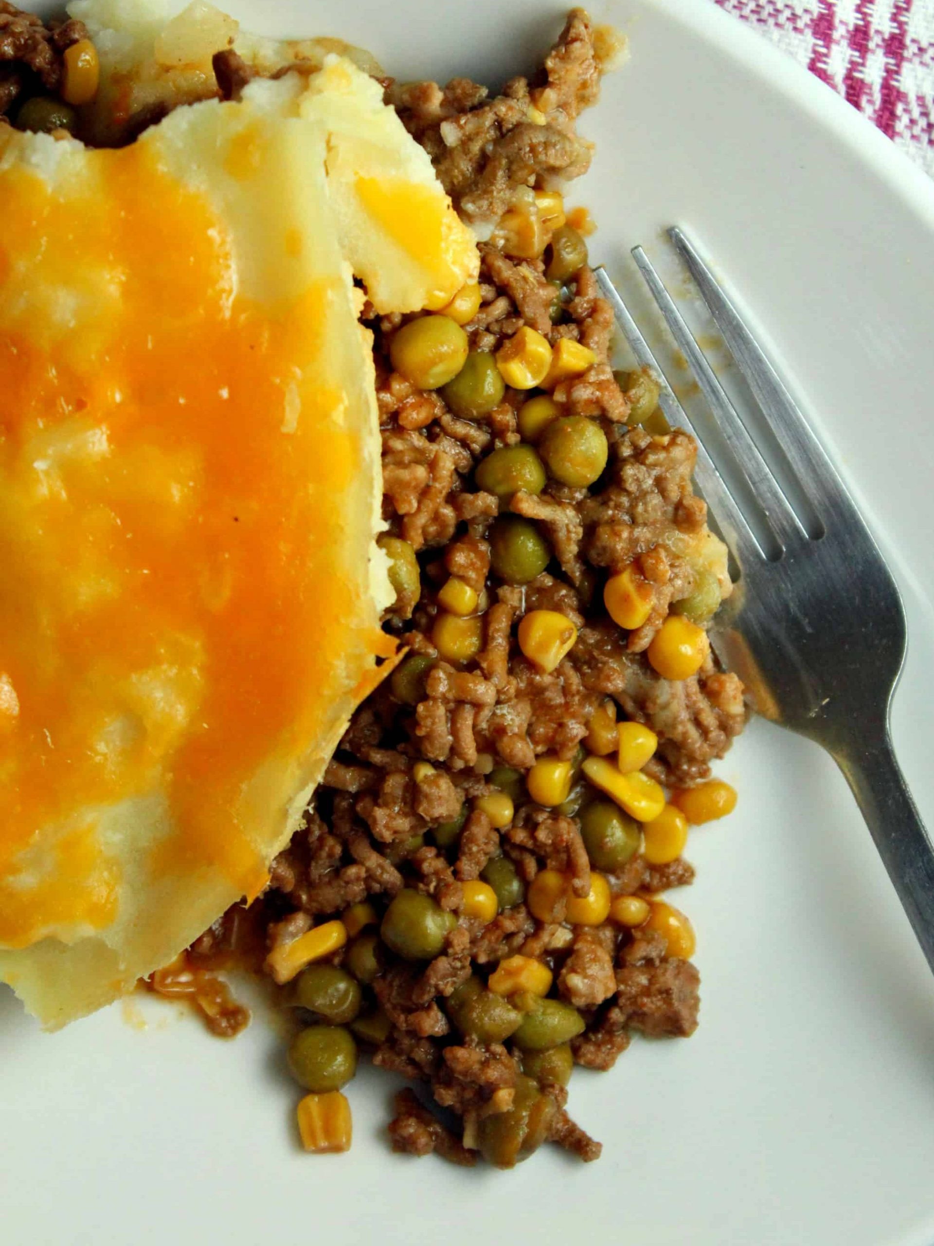 overview of ground beef sheperd pie on a plate