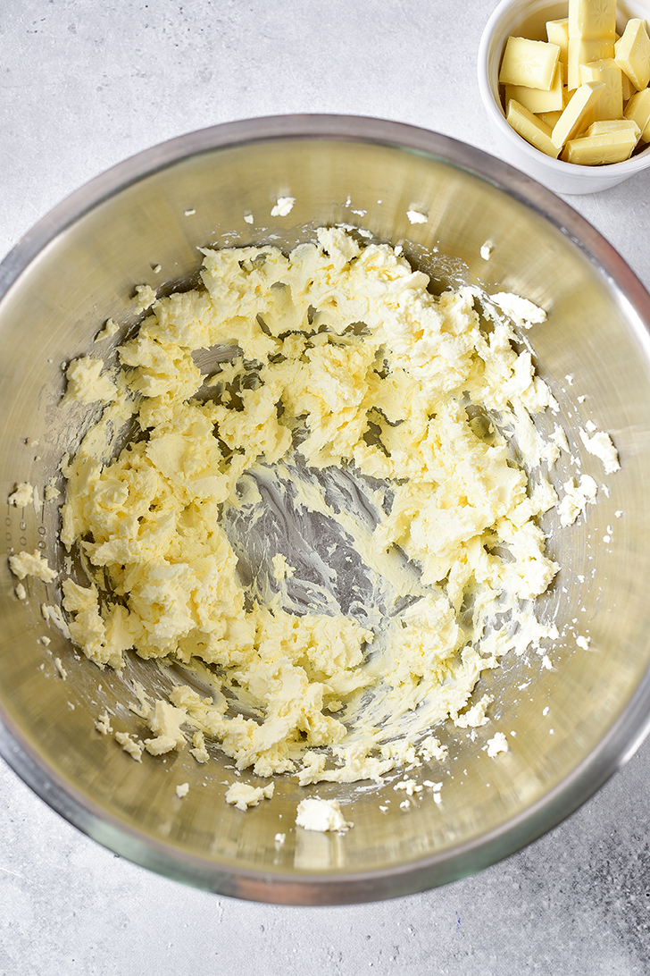 Beat the cream cheese in a mixing bowl until smooth. 