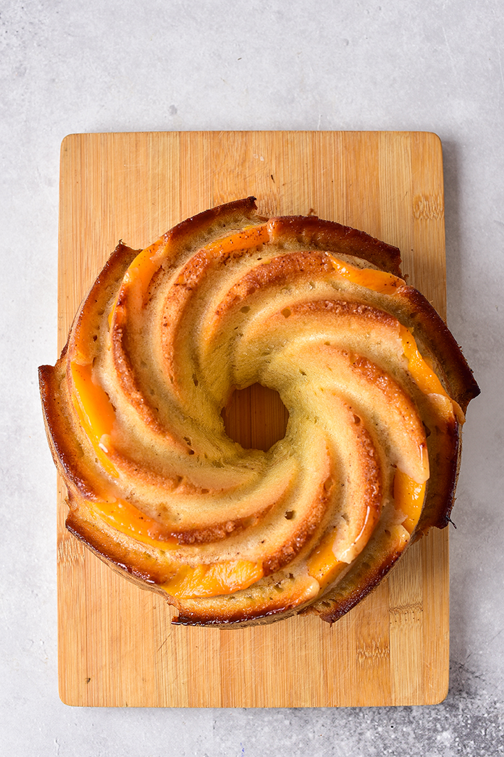 Flip the bundt pan over onto a plate or platter to release the cake from the pan, and allow it to cool. 