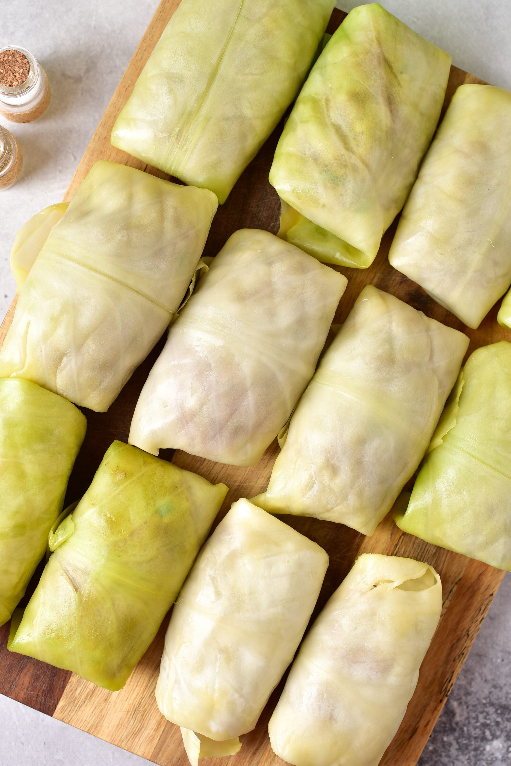 Roll the cabbage leaves around the filling to form a wrapped burrito shape. 