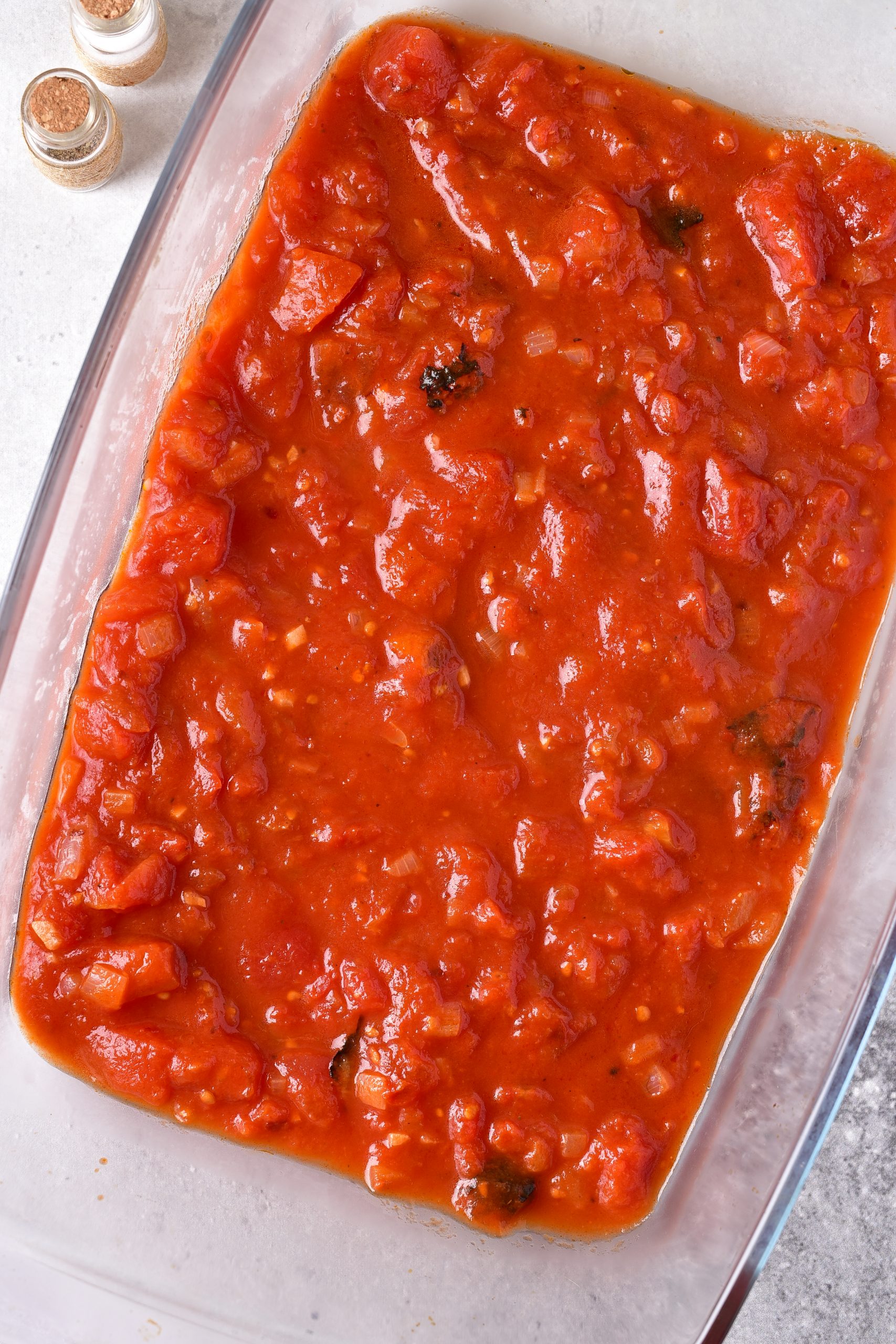 Layer ½ the sauce into a 9x13 baking dish.